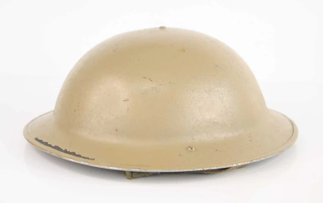 Lot 1022 - A WW II Brodie pattern steel helmet, having