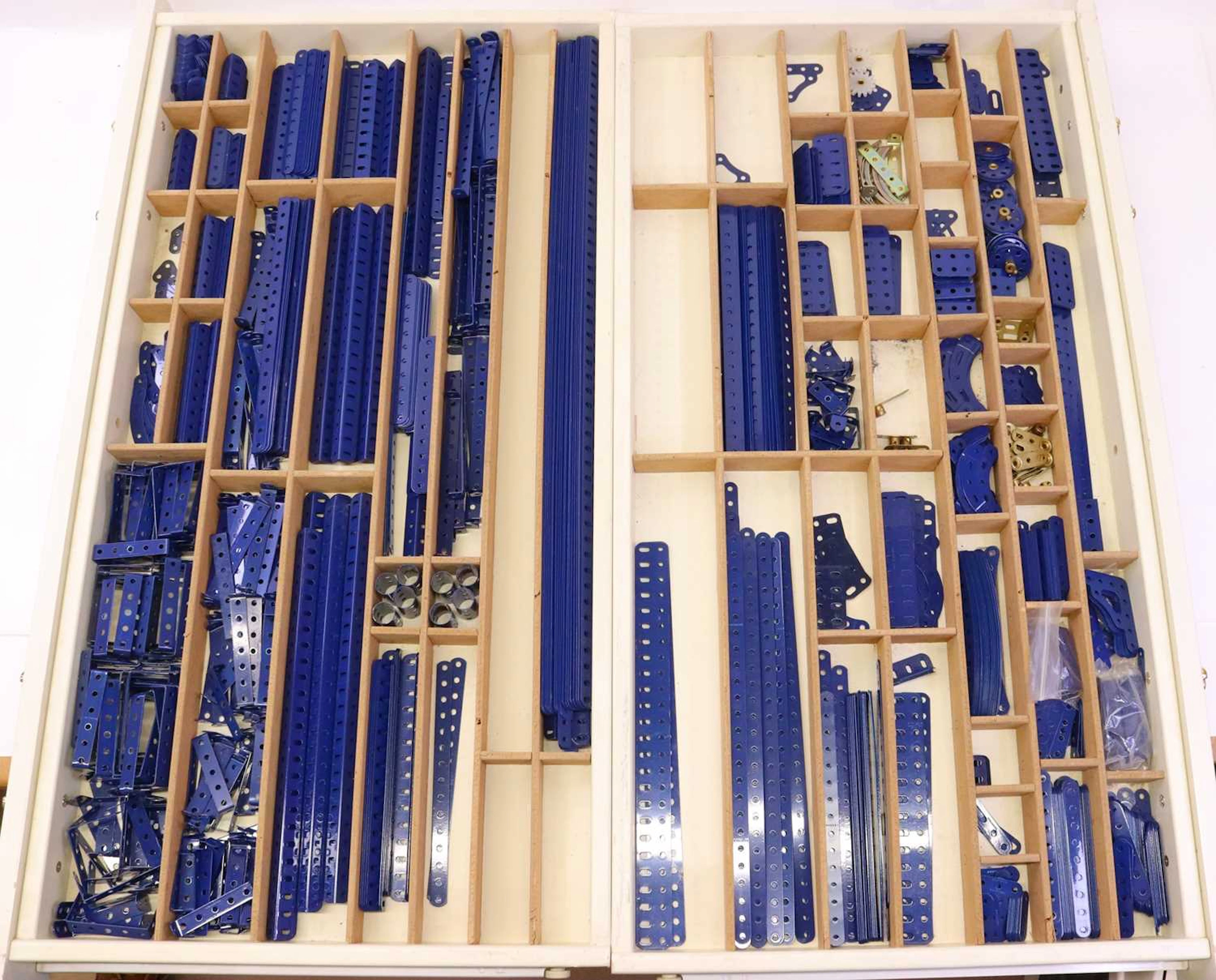 Lot 88 - Two drawers containing various Meccano blue