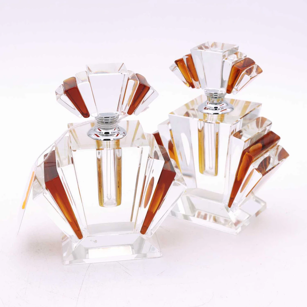 Lot 88 - A pair of reproduction Art Deco style amber