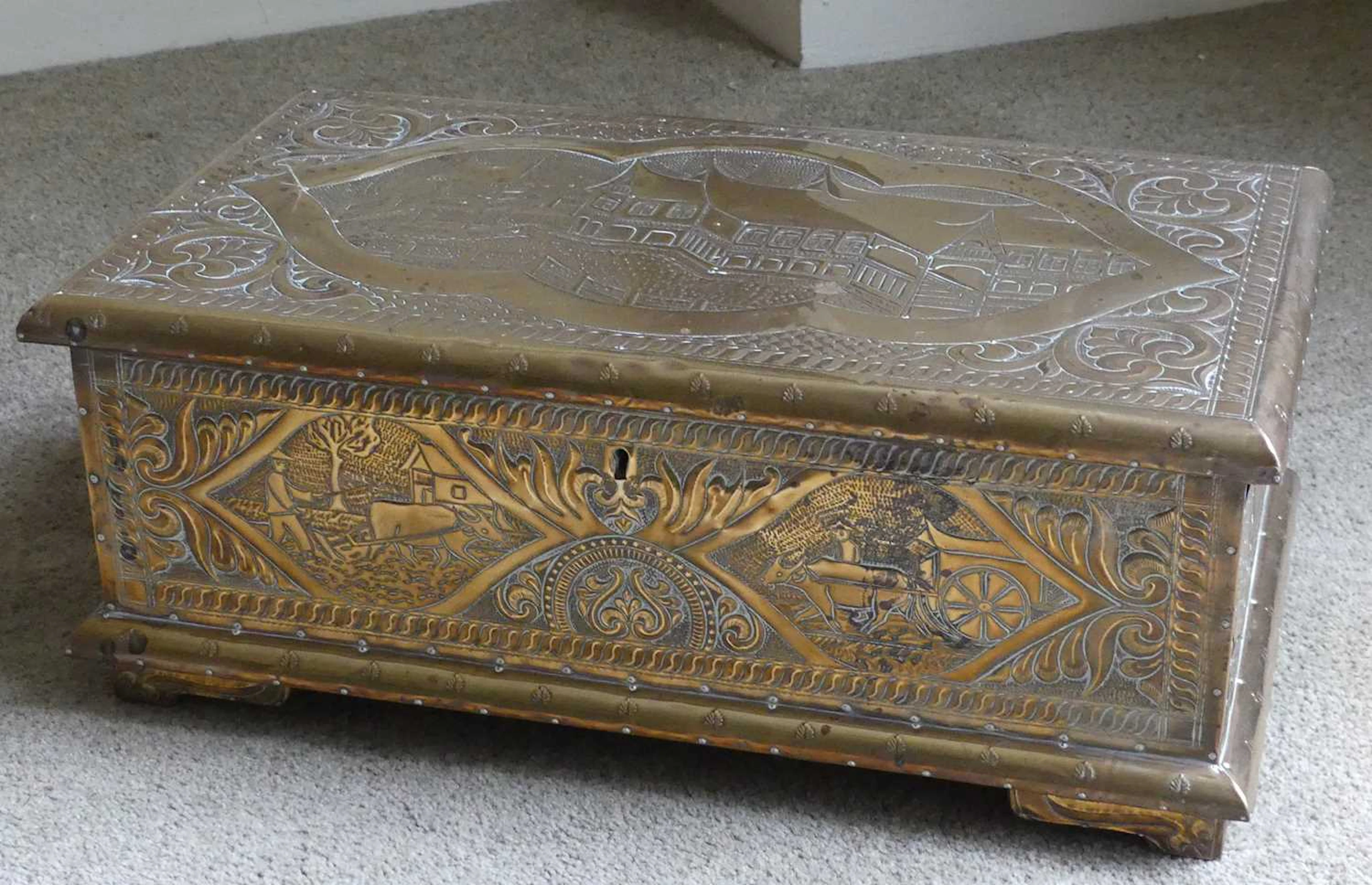Lot 1327 - A 19th century Dutch embossed brass clad
