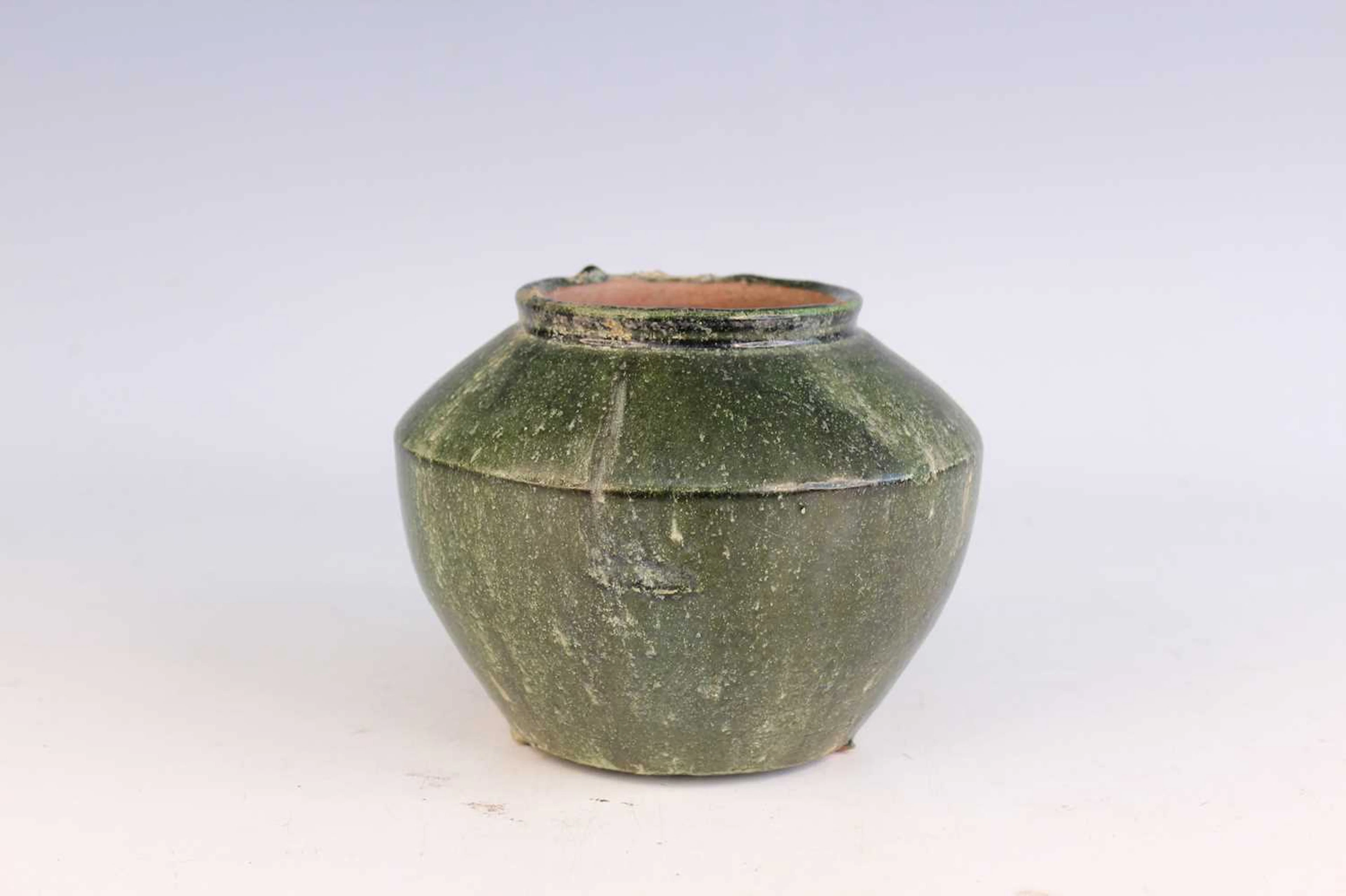 Lot 60 - A Chinese Green-Glazed Pottery Jar, Han