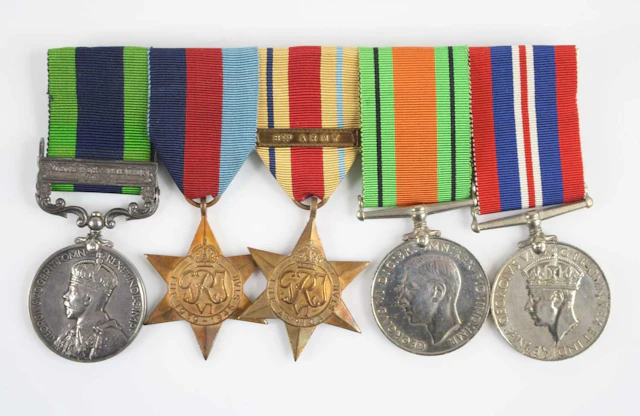Lot 1220 - A group of five medals to include India