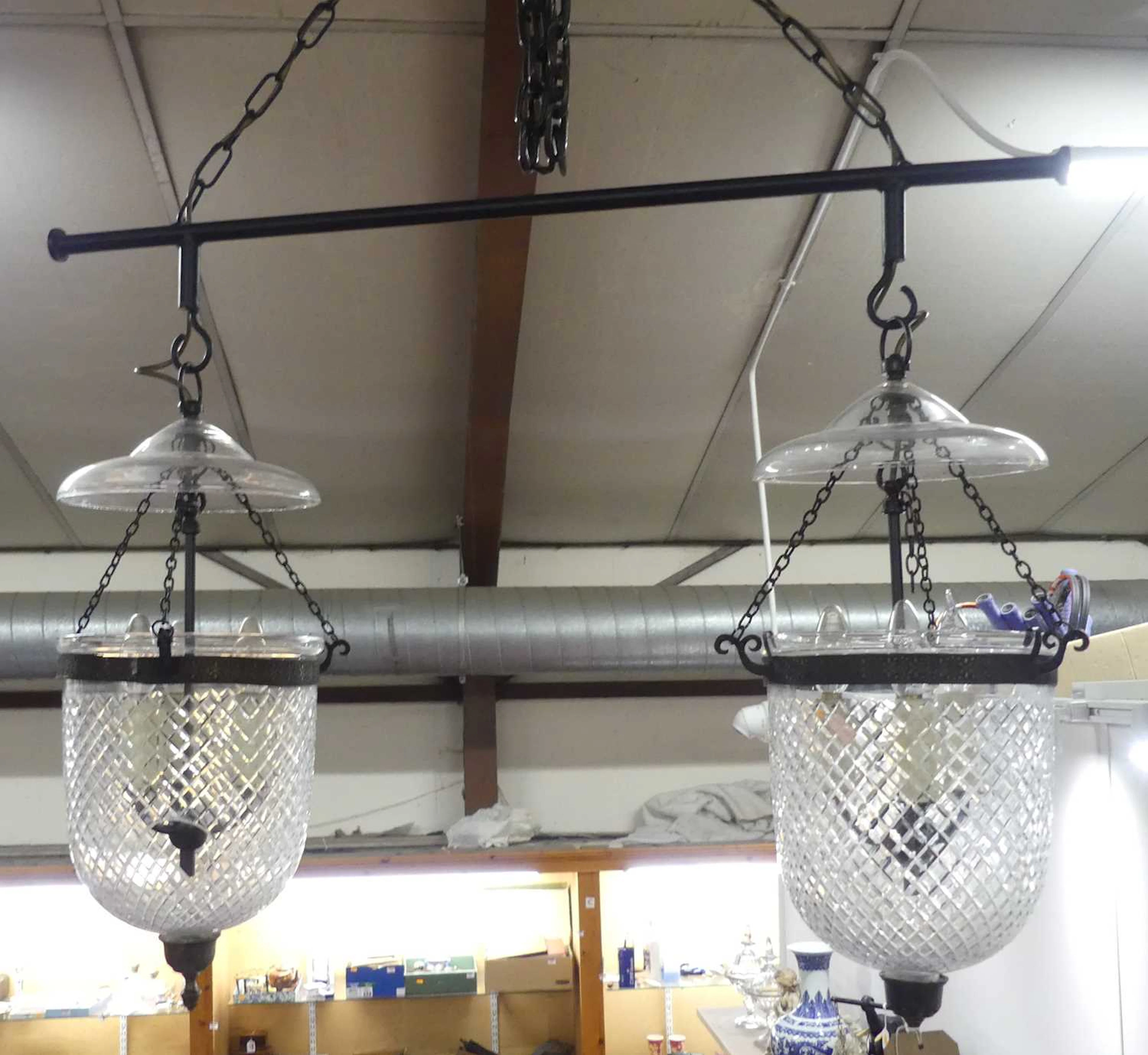 Lot 663 - A twin hanging ceiling light, raised on a