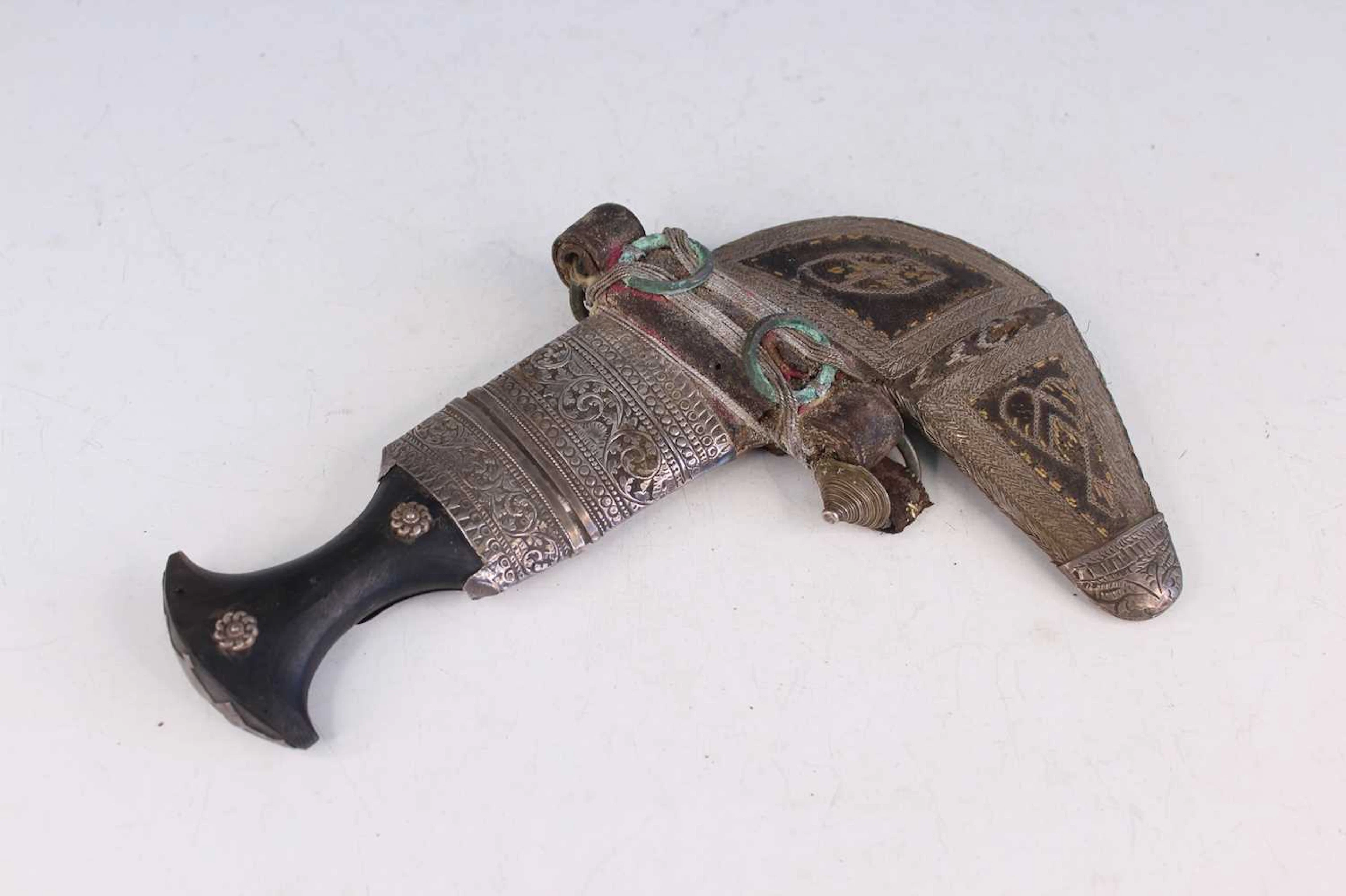 Lot 225 - An Omani White Metal-Mounted Khanjar Dagger