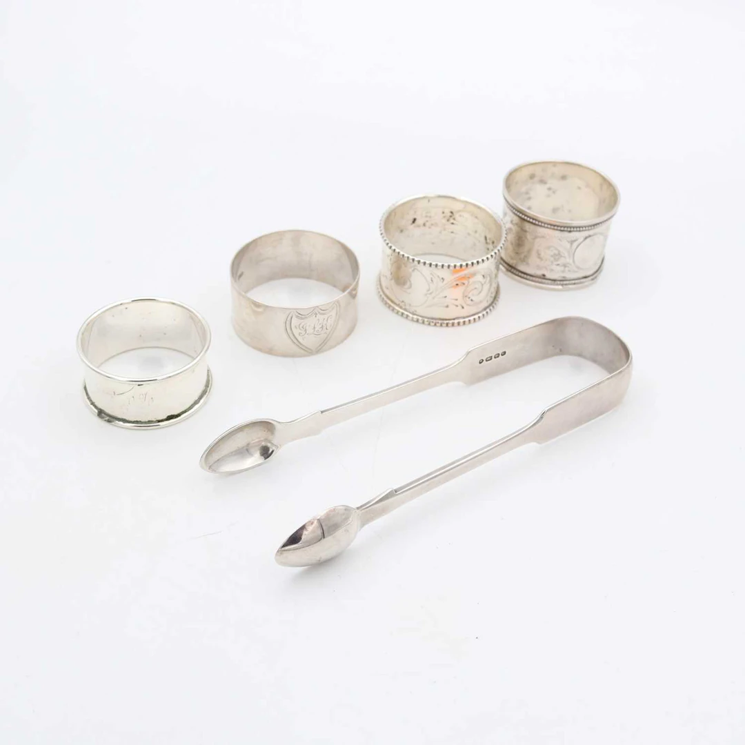 Lot 330 - A pair of early Victorian silver sugar tongs