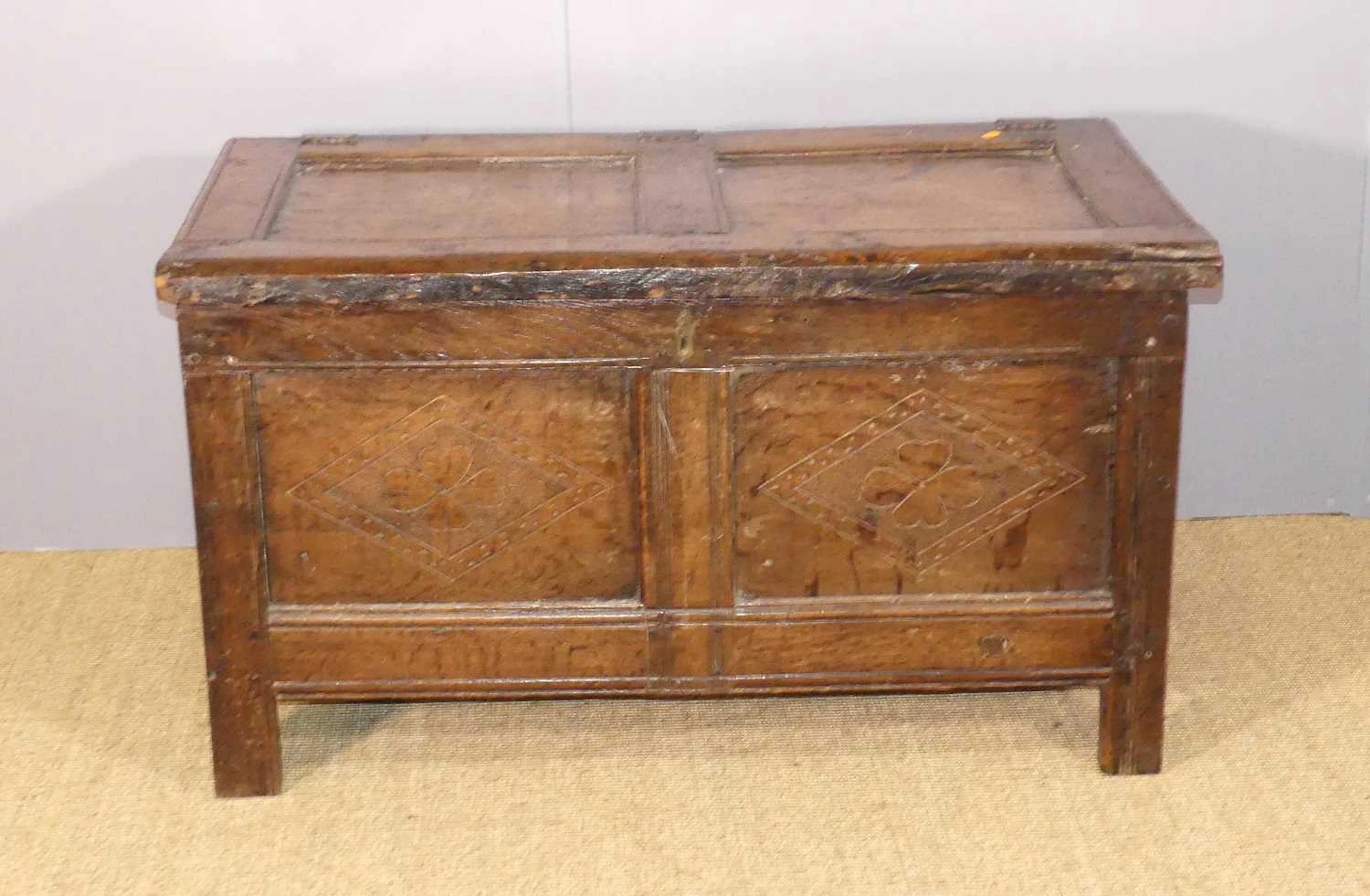 Lot 648 - An antique heavy joined oak two-panelled