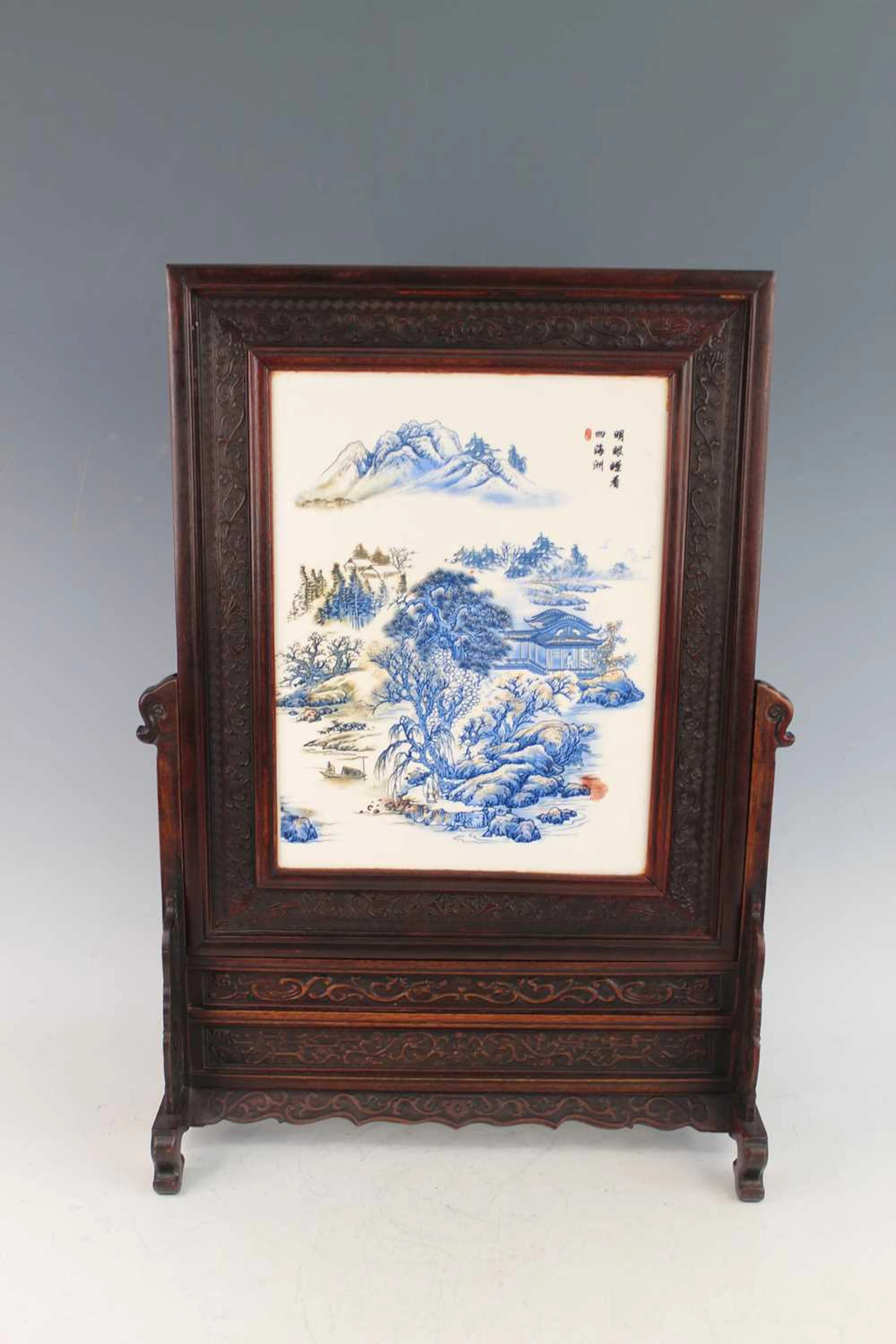 Lot 159 - A Chinese carved hardwood table screen inset