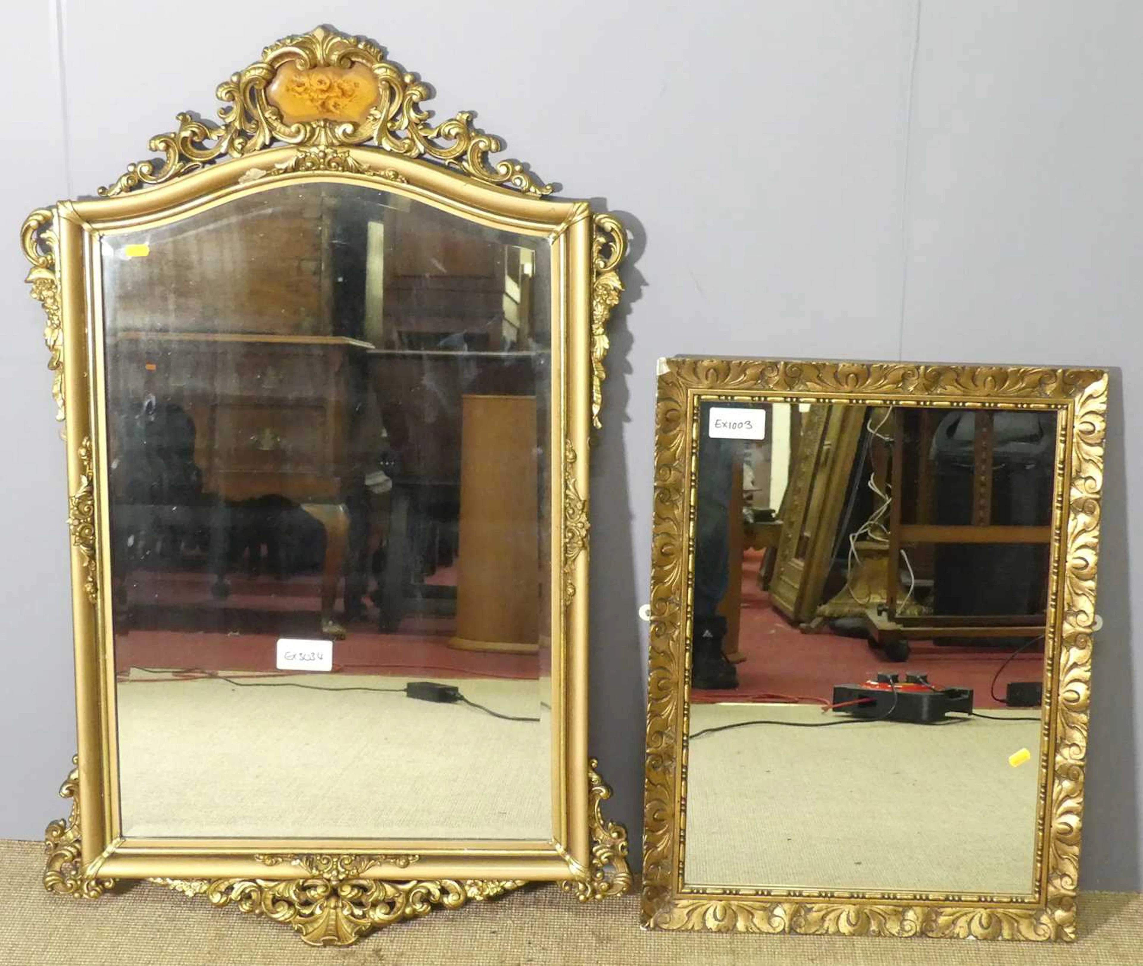 Lot 611 - A gilt framed bevelled rectangular wall