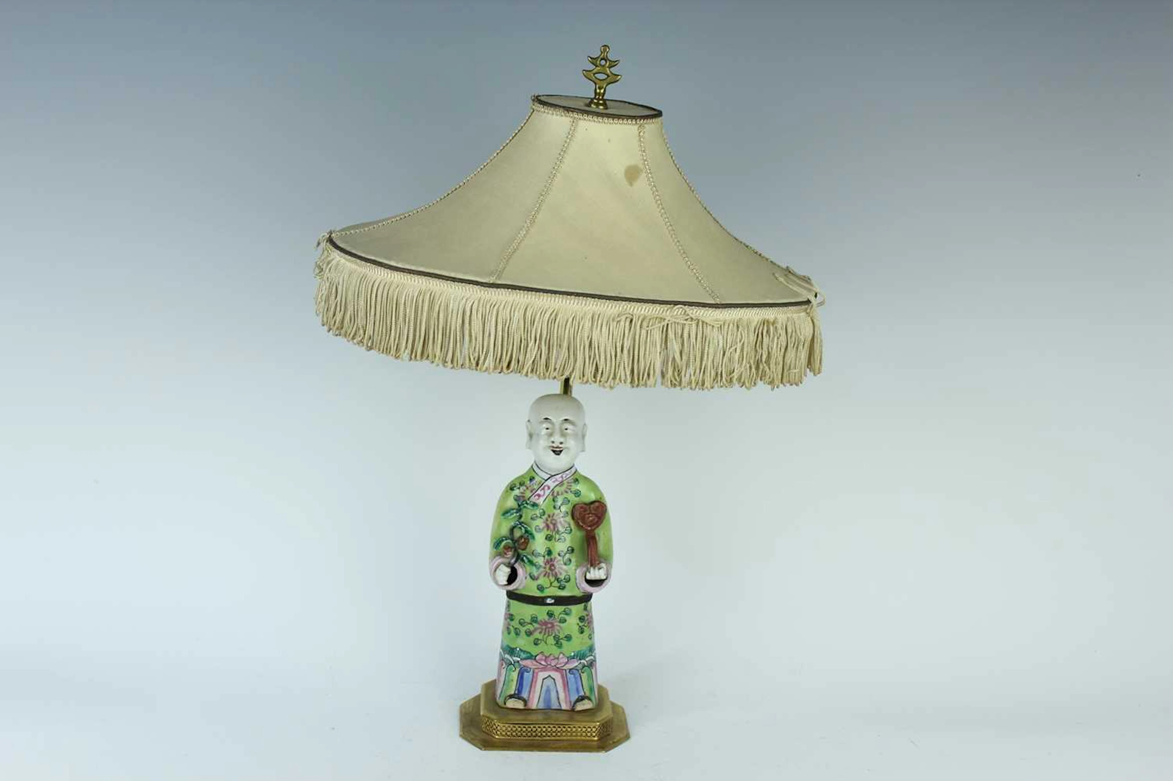 Lot 142 - A Chinese famille rose figure of a boy