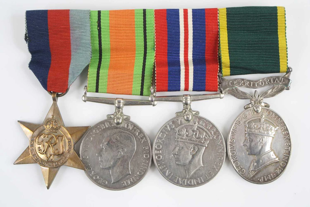 Lot 1168 - A group of four medals to include WW II