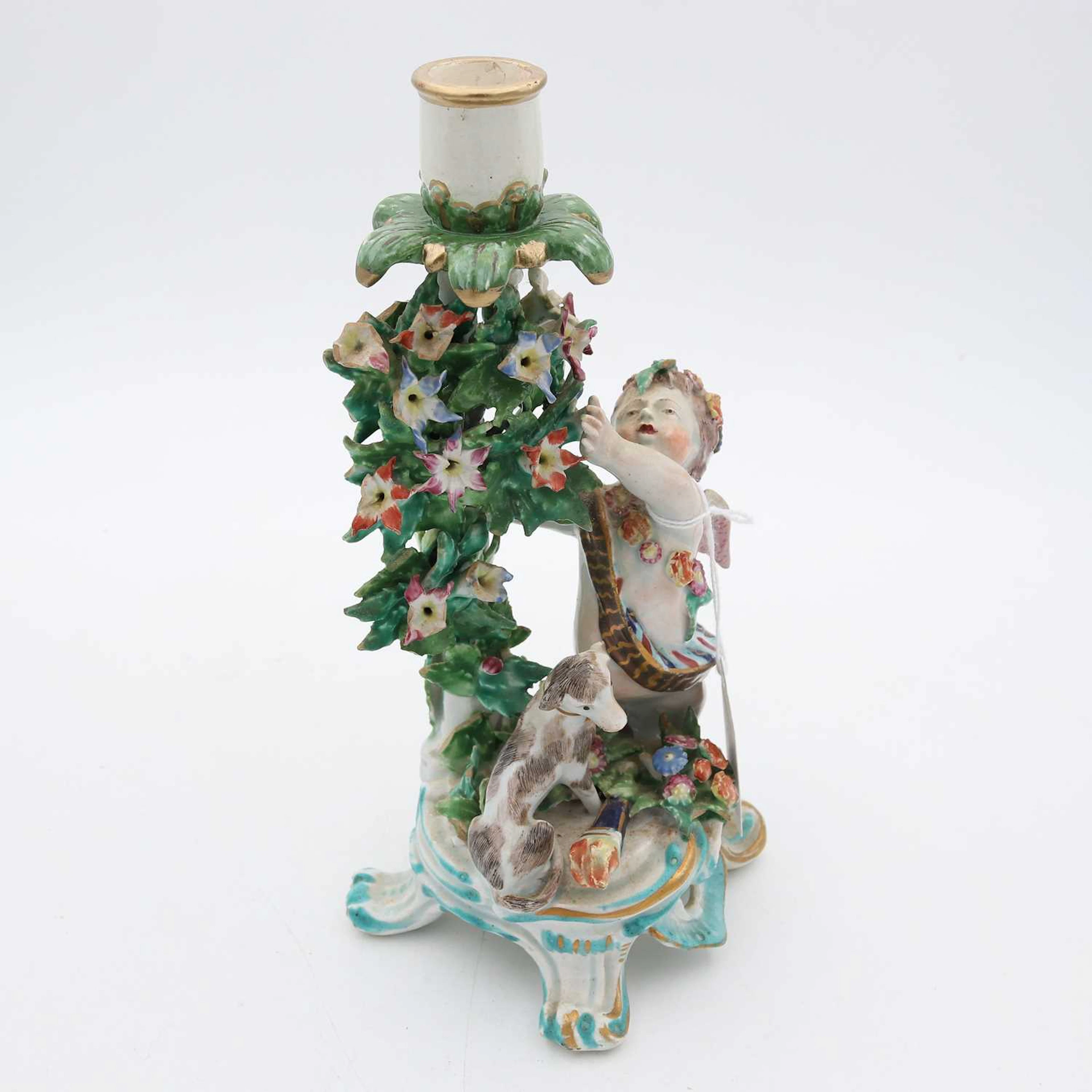 Lot 112 - A Bow porcelain cherub candle-holder, with