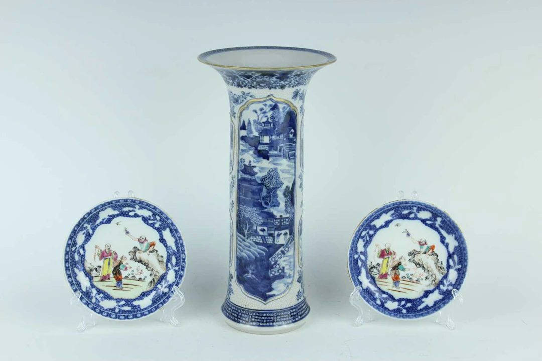 Lot 131 - A Chinese blue and white gu-shaped vase and