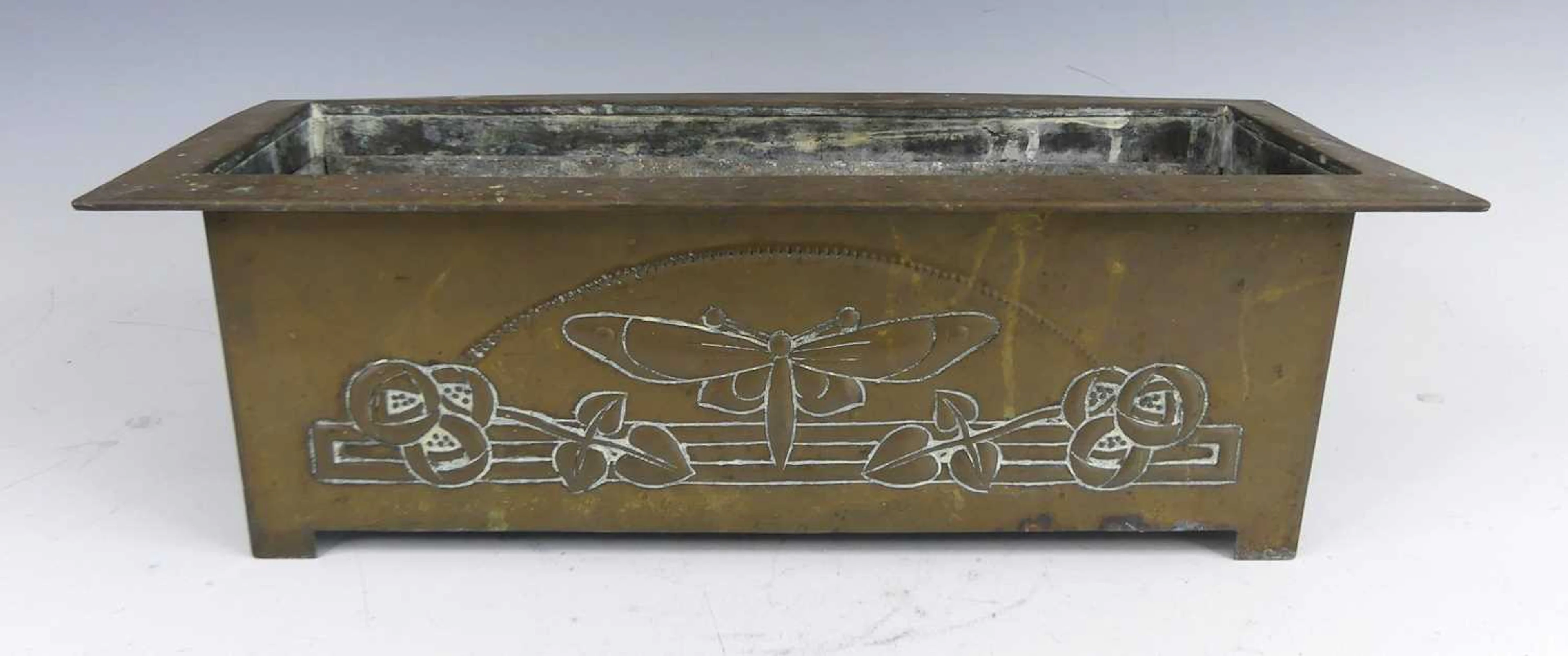 Lot 172 - An Arts & Crafts Glasgow School style brass