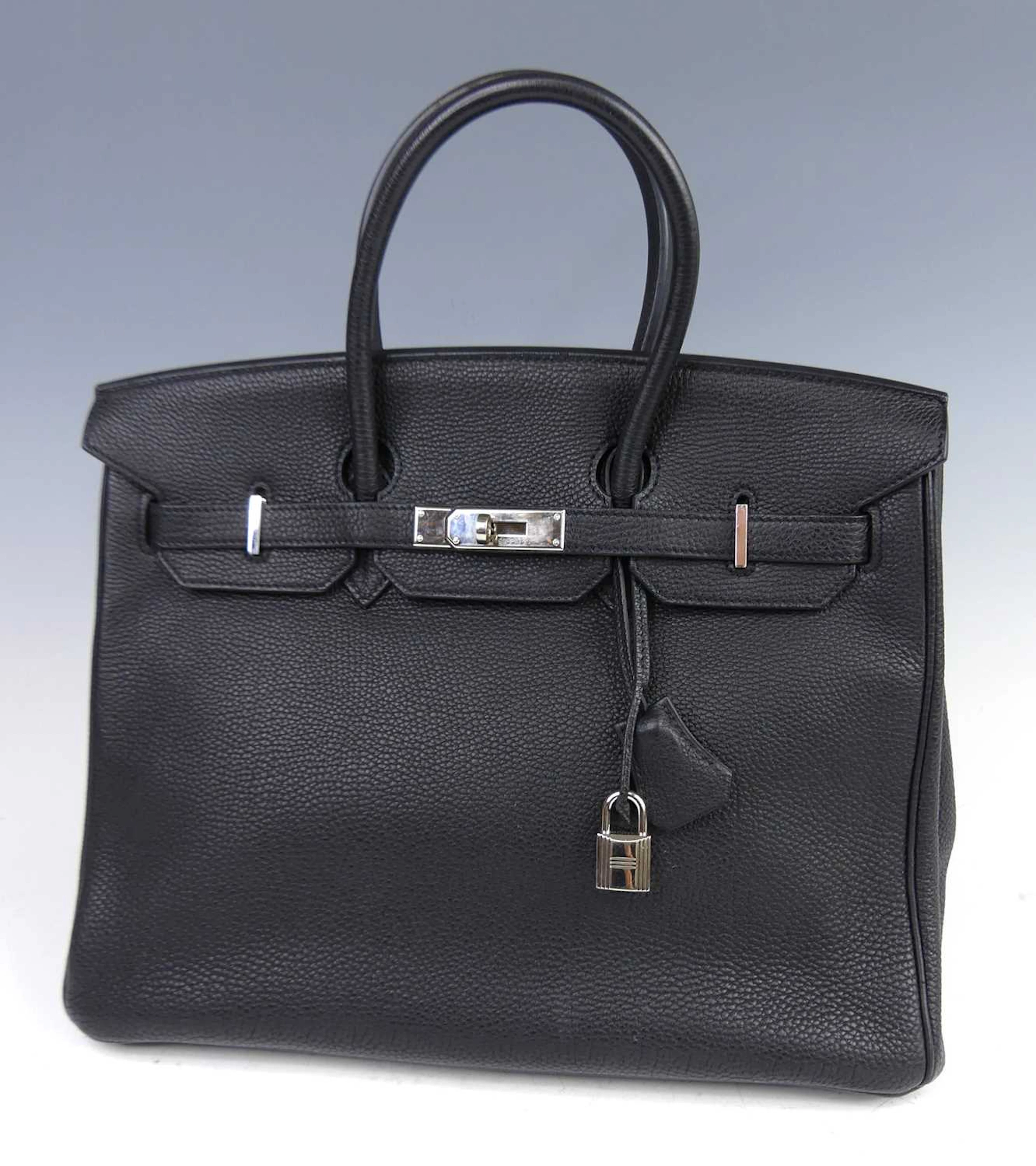 Lot 156 - Hermès - a Birkin 35 black leather handbag