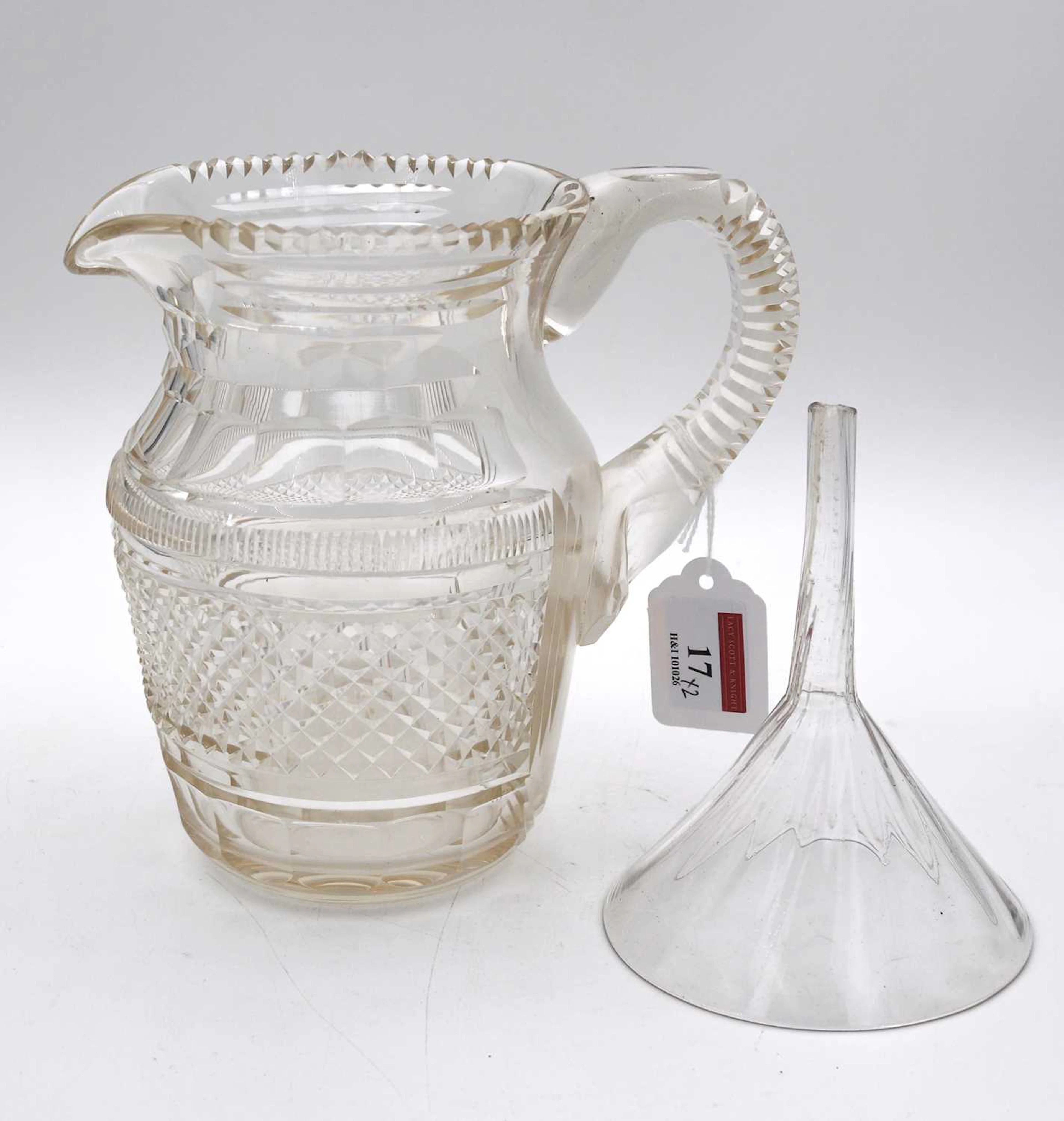 Lot 17 - A George III Irish cut glass jug, h.18cm;
