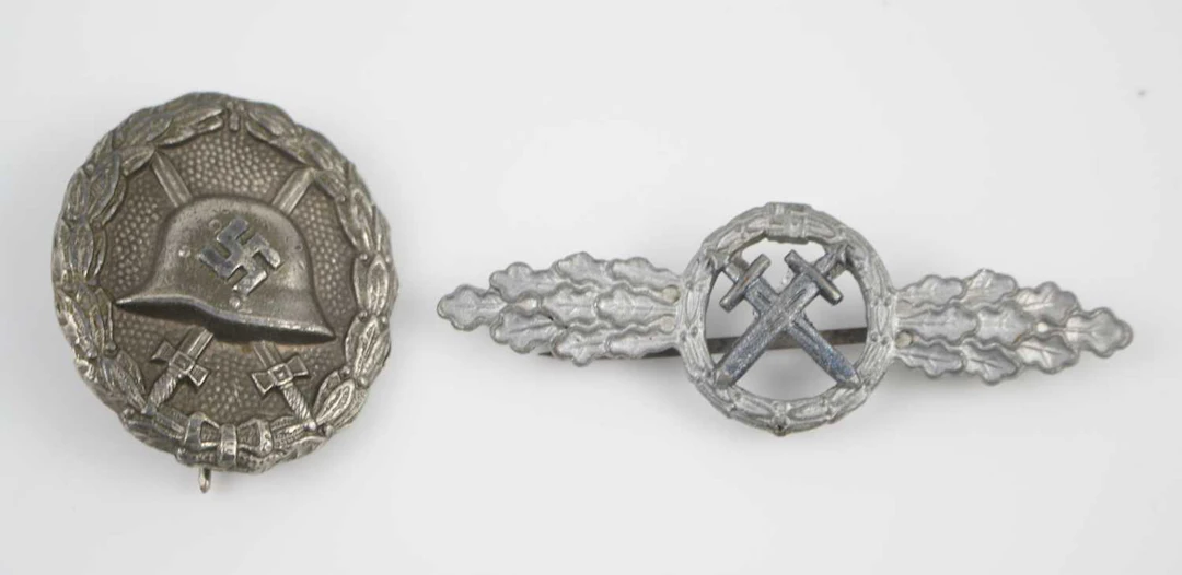Lot 1031 - A German Wound Badge, in silver with pin