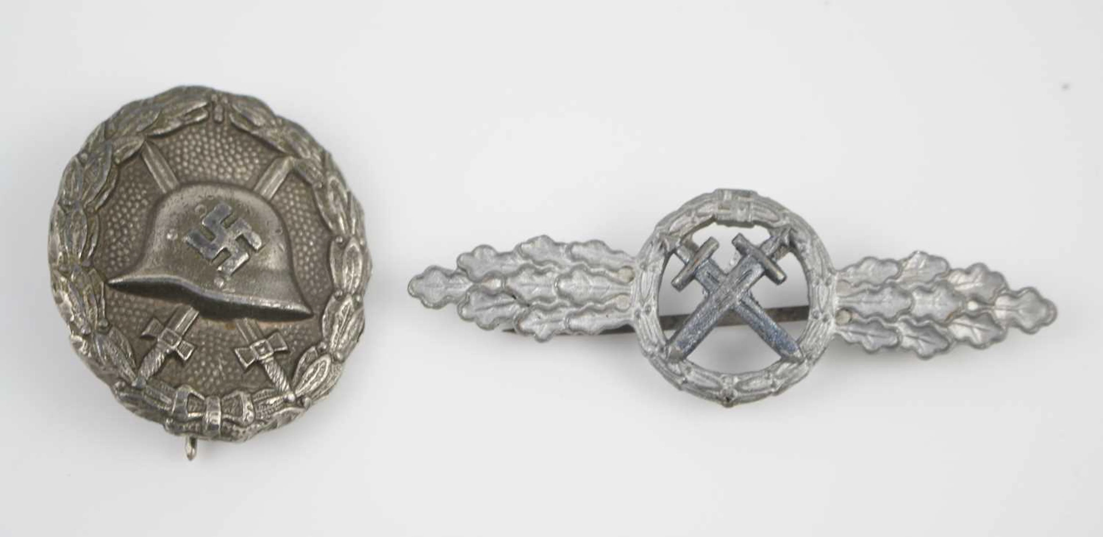 Lot 1031 - A German Wound Badge, in silver with pin