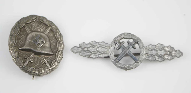 Lot 1031 - A German Wound Badge, in silver with pin