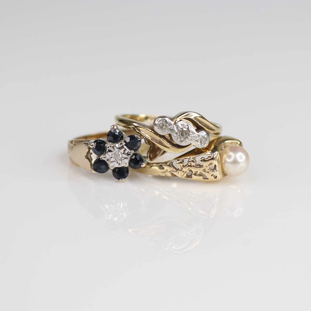 Lot 224 - Three rings, being a yellow and white metal