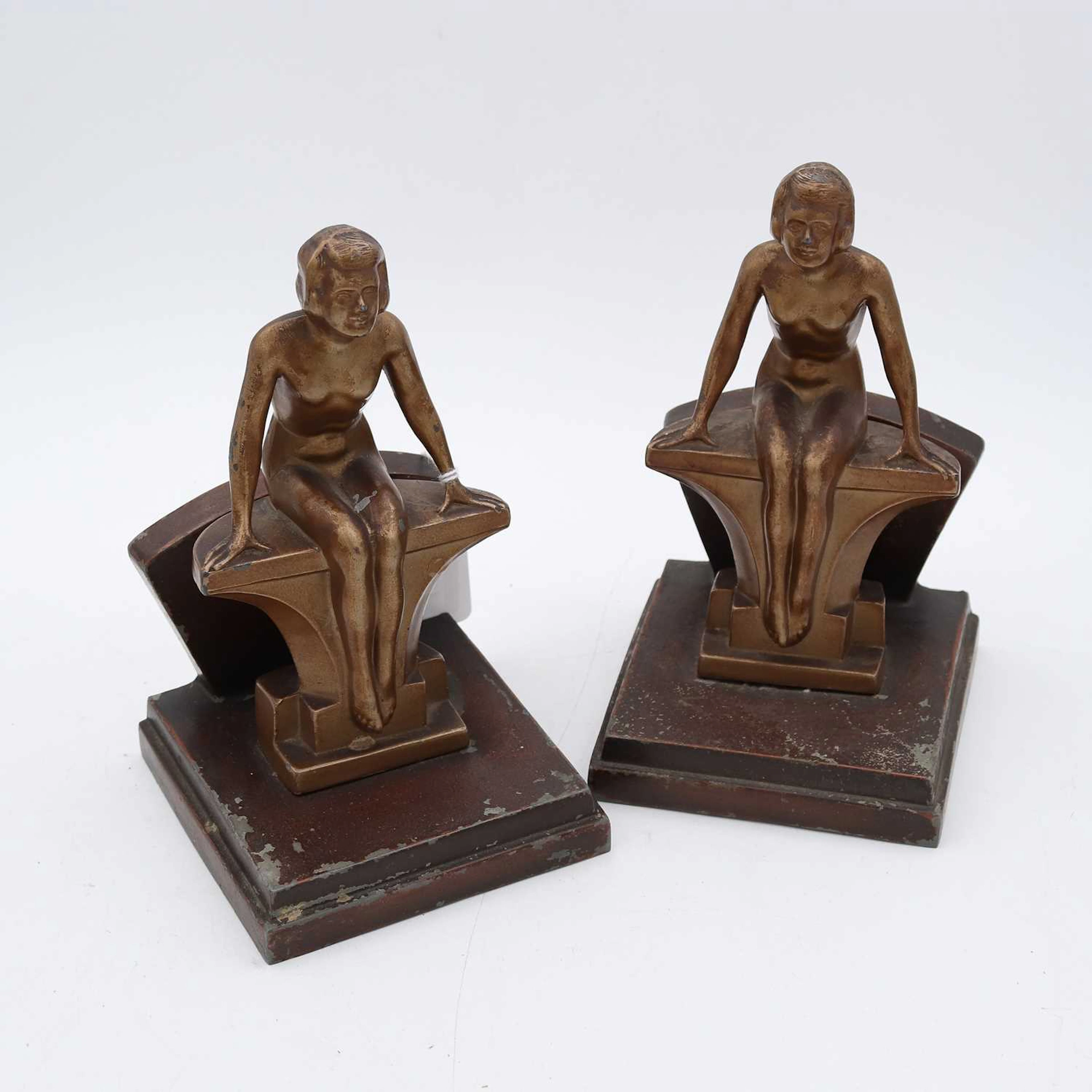 Lot 128 - A pair of Art Deco style painted spelter