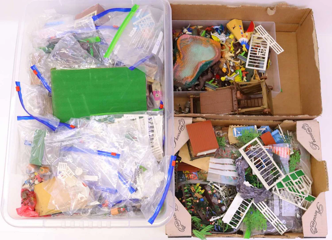 Lot 553 - Three boxes containing various plastic