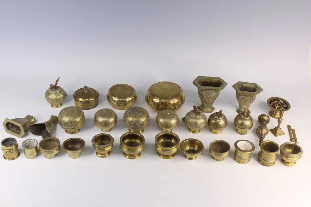 Lot 221 - A Group of 32 Indonesian Brass Items, 20th