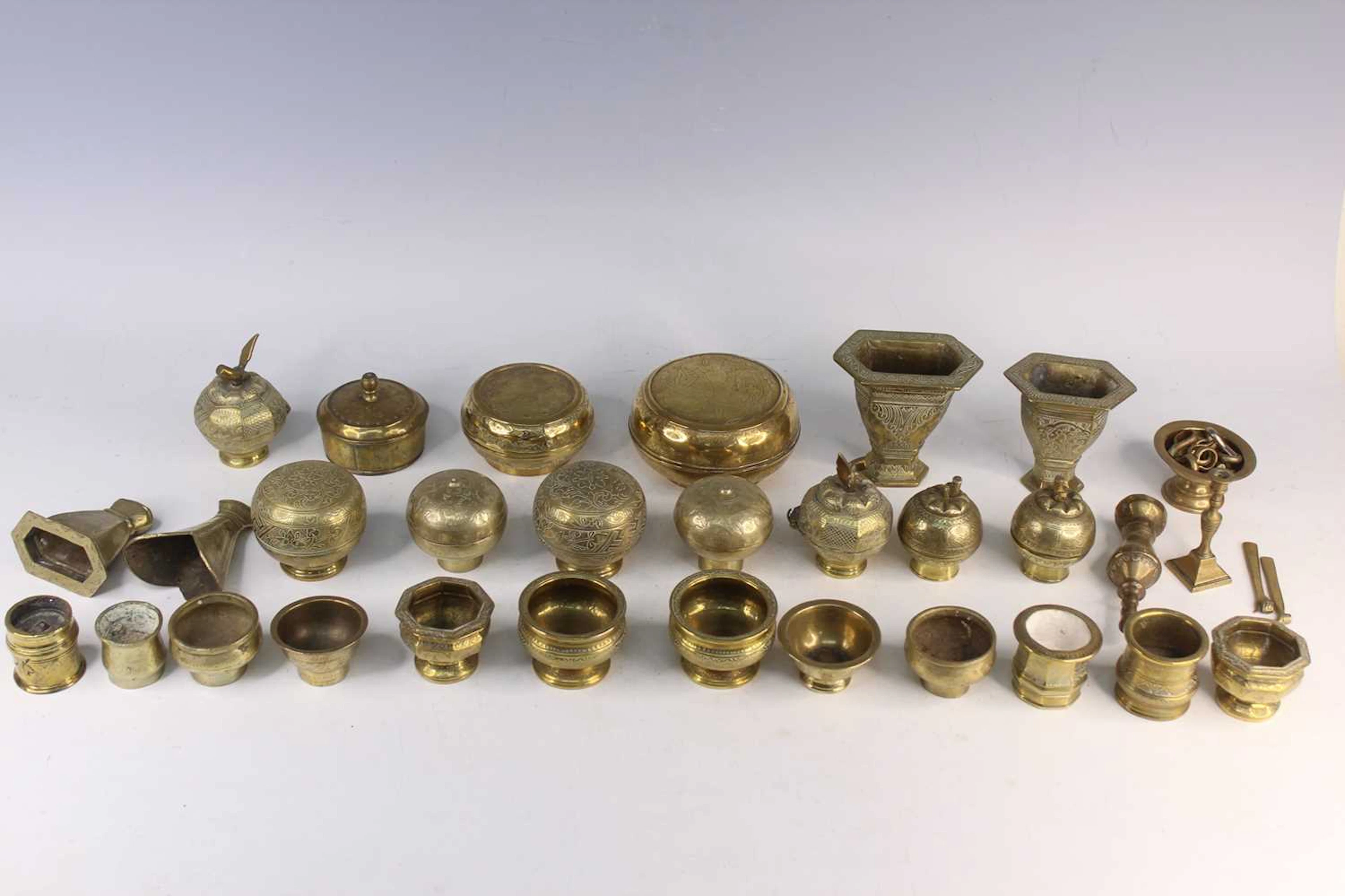 Lot 221 - A Group of 32 Indonesian Brass Items, 20th
