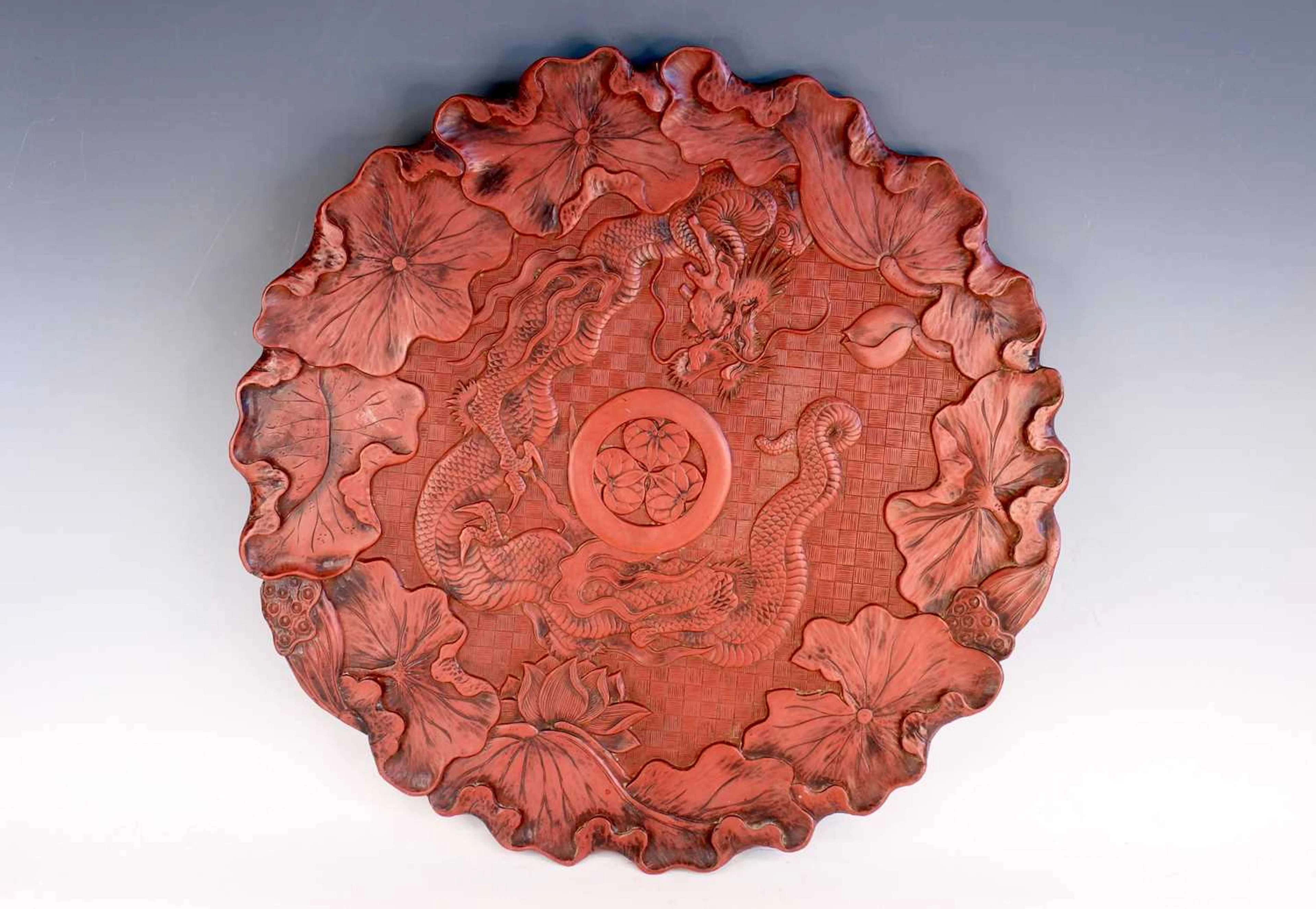 Lot 200 - A large Japanese carved cinnabar lacquer