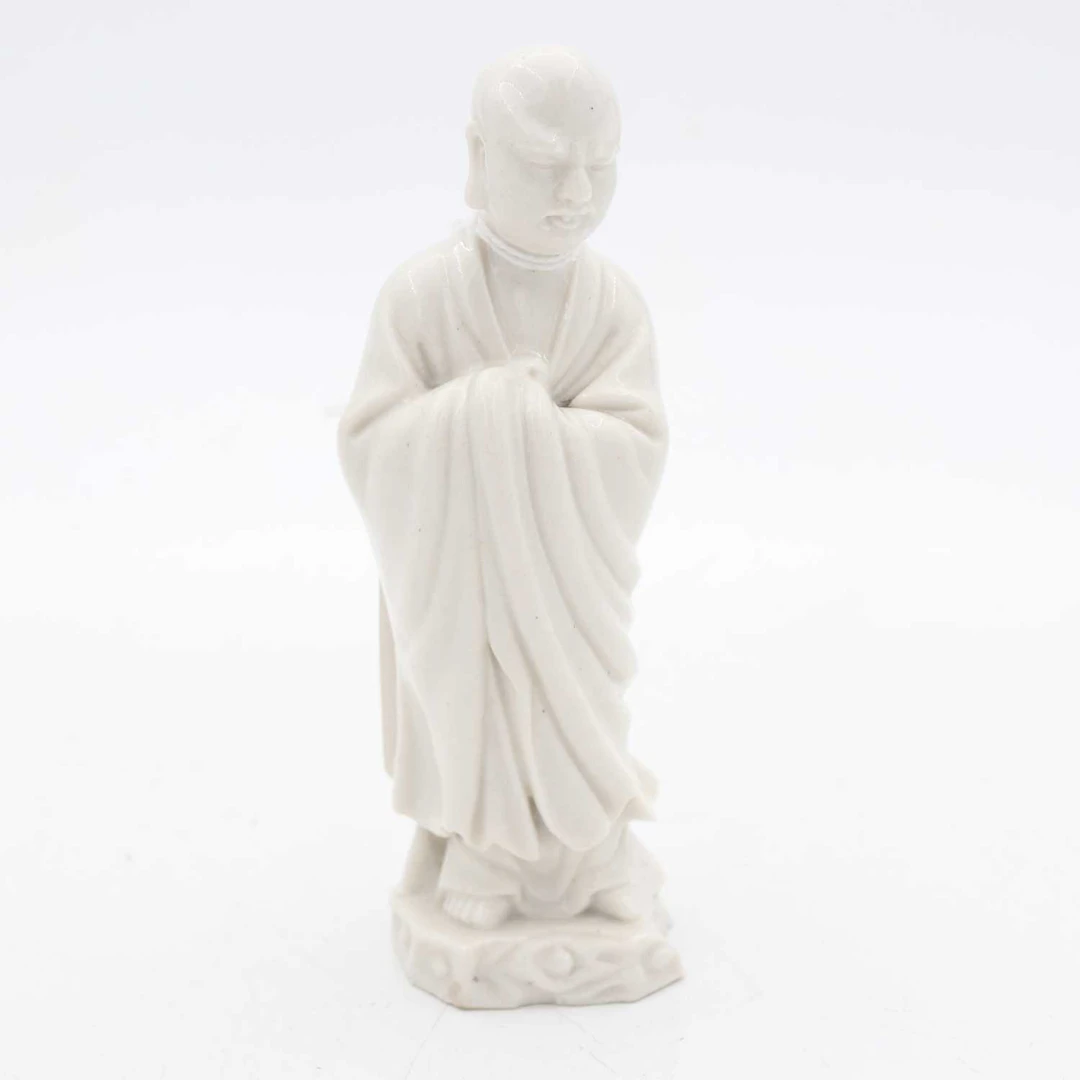 Lot 90 - A blanc-de-chine figure of Luhan, 20th