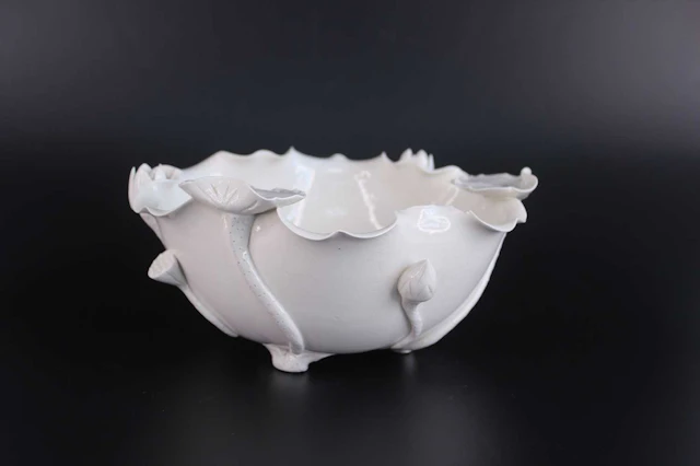 Lot 47 - A Chinese White-Glazed Lotus-Form Bowl