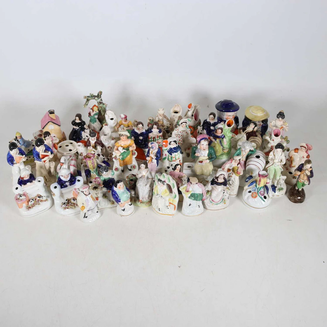 Lot 131 - A collection of Staffordshire pottery
