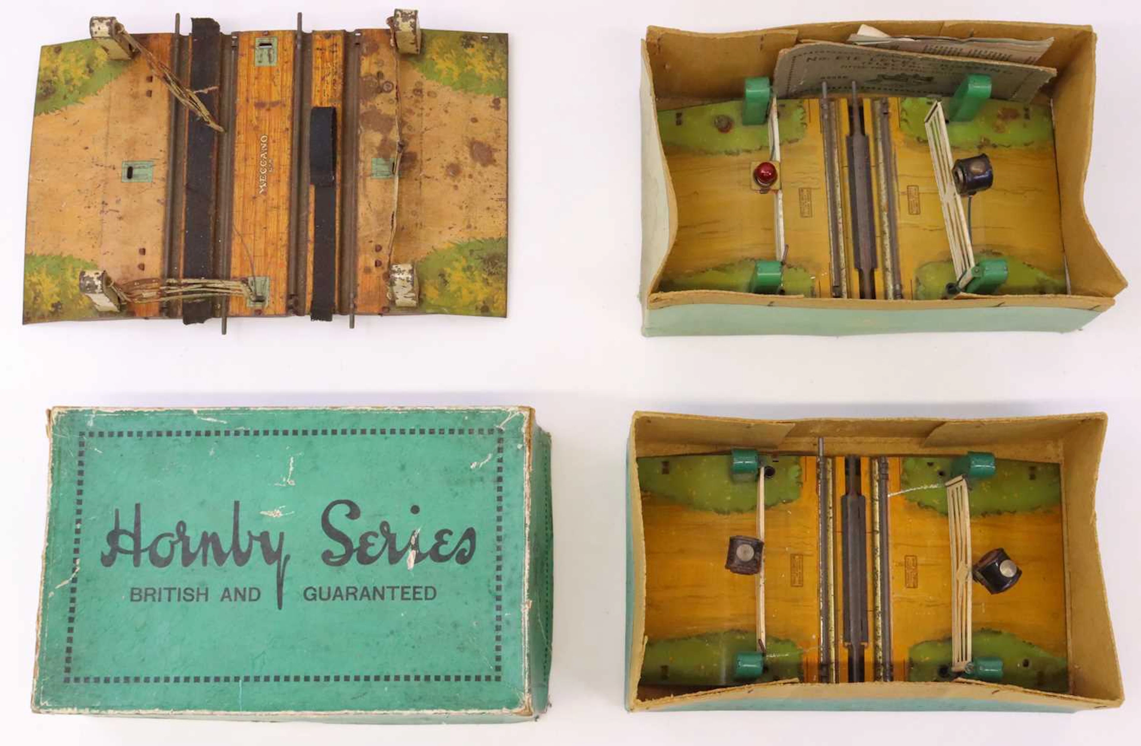 Lot 332 - Three Hornby 0-gauge level crossings: 1932-3