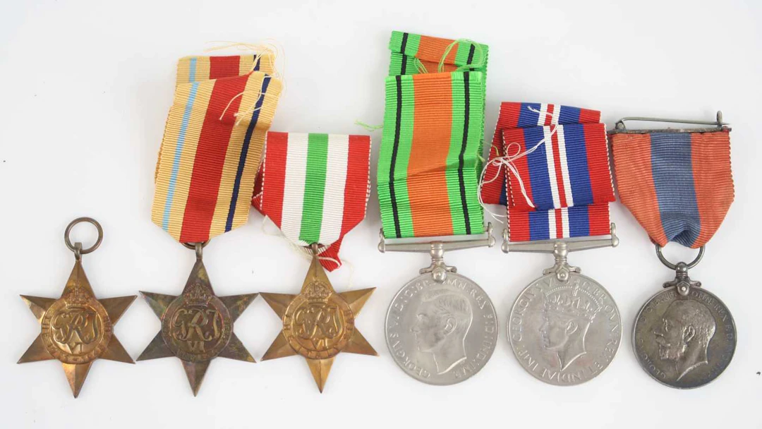 Lot 1026 - A group of five WW II medals to include