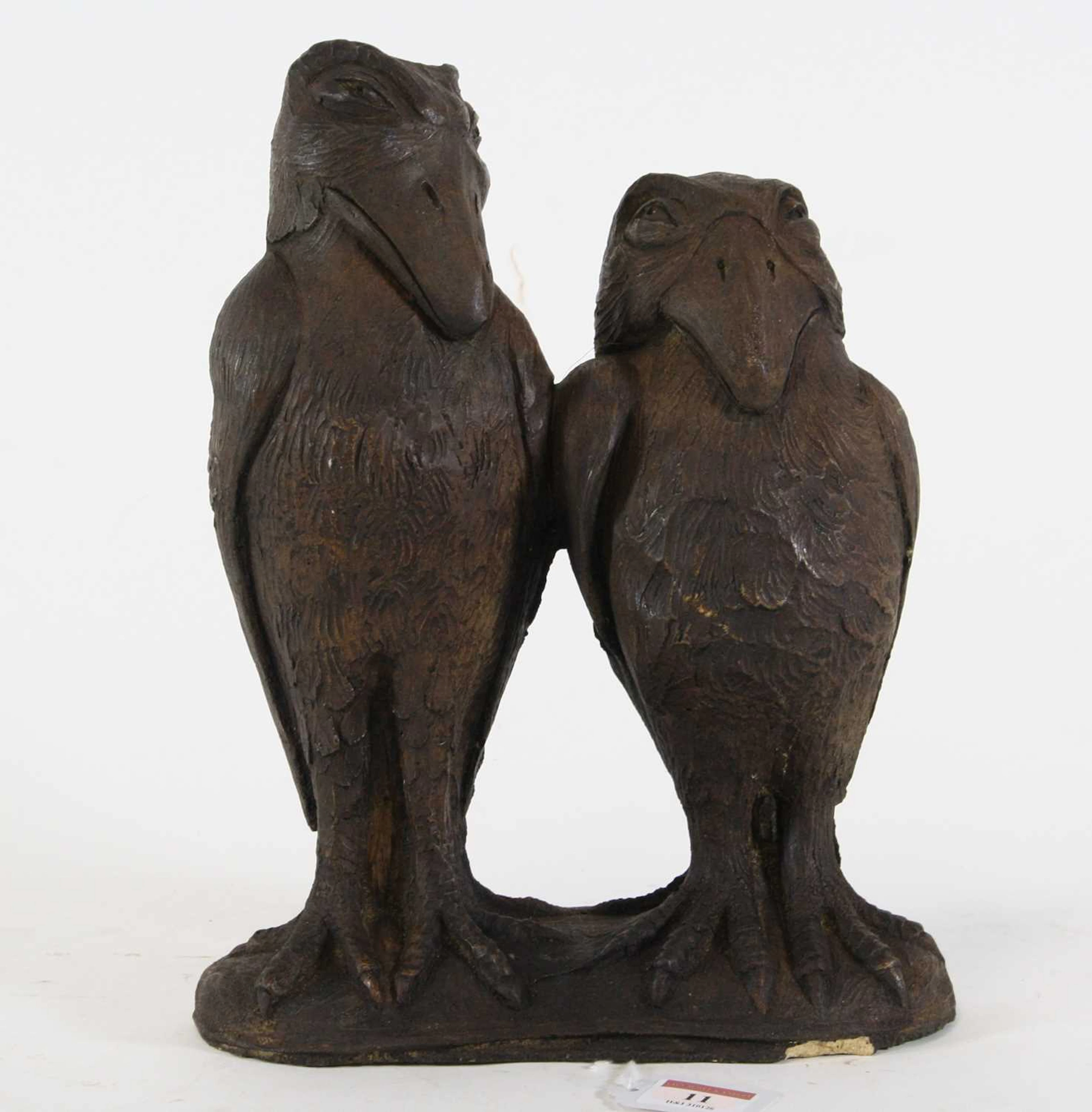 Lot 11 - A painted stoneware figure group of two