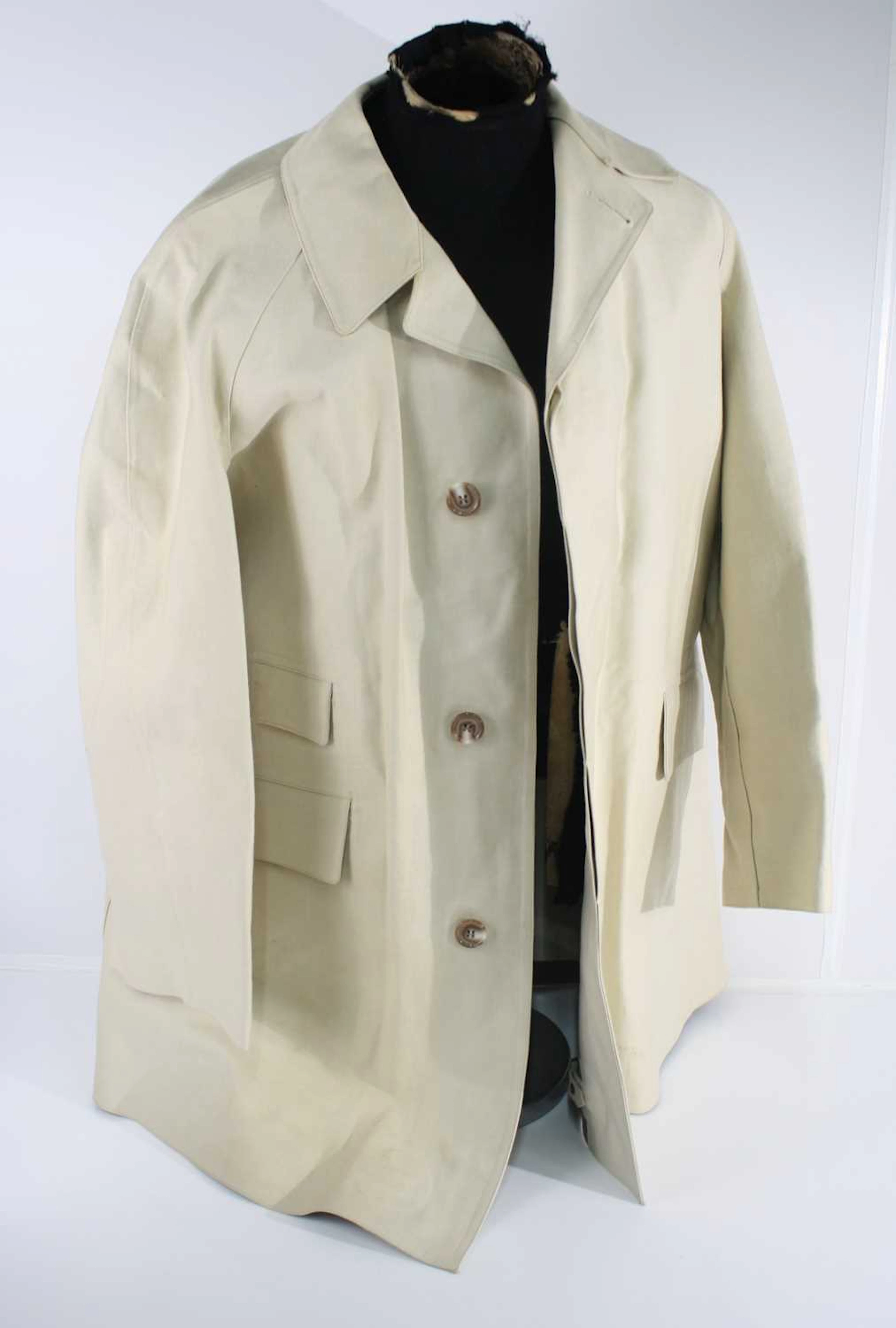 Lot 1333 - A vintage P&O waterproof riding coat, circa