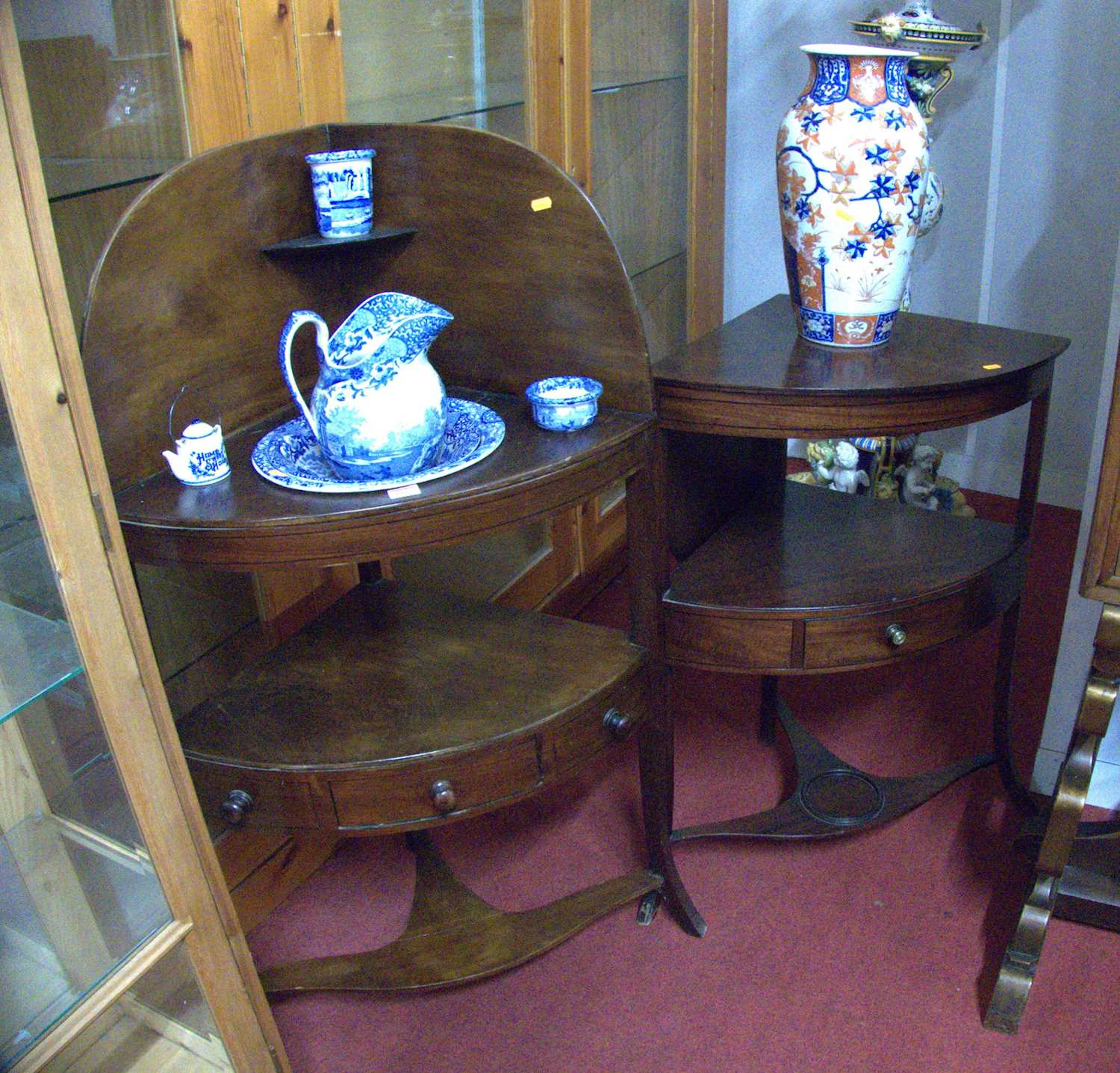 Lot 1165 - An early 19th century mahogany bow front