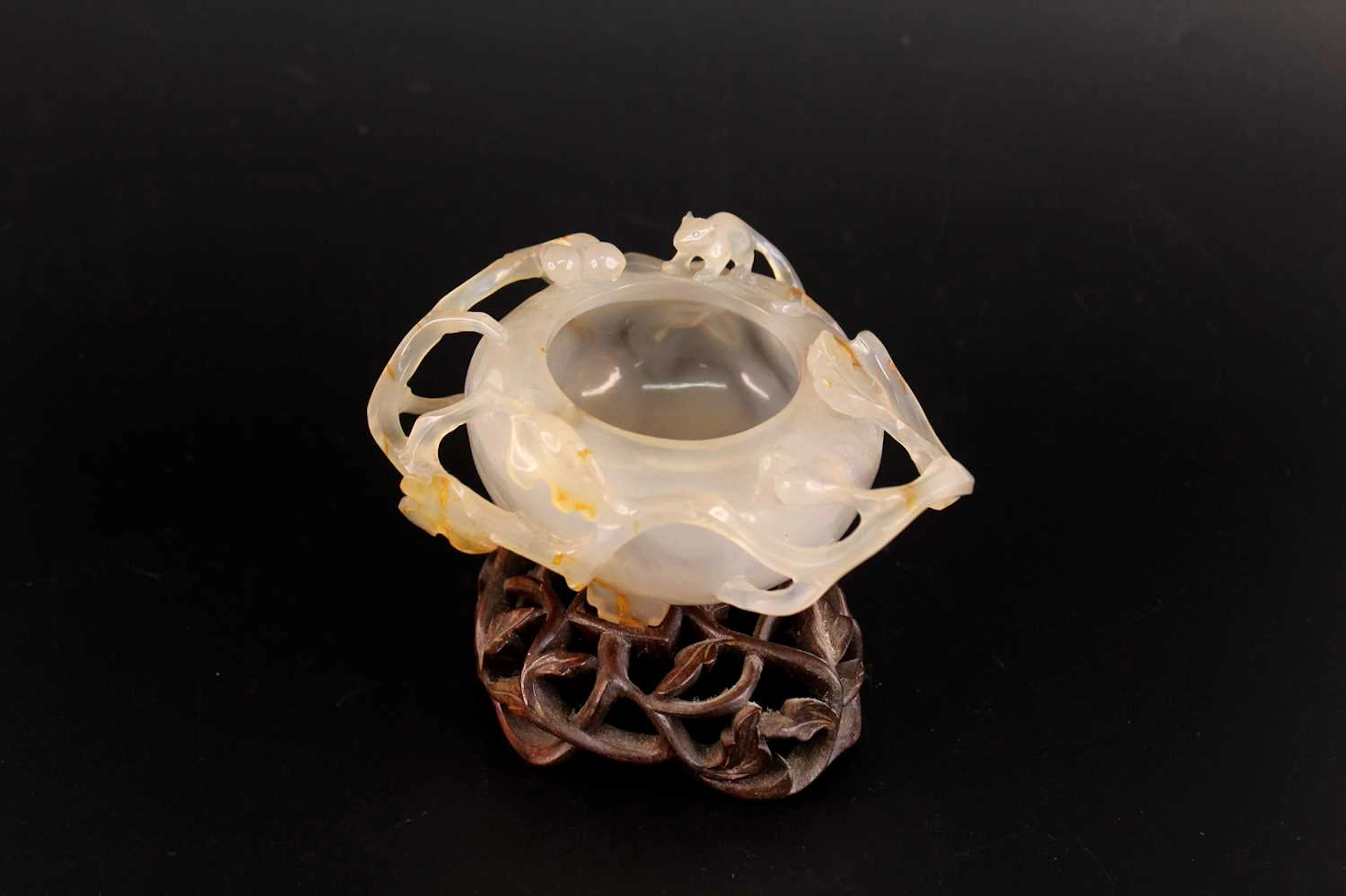 Lot 46 - A Chinese Carved Agate 'Squirrel and Grapes'