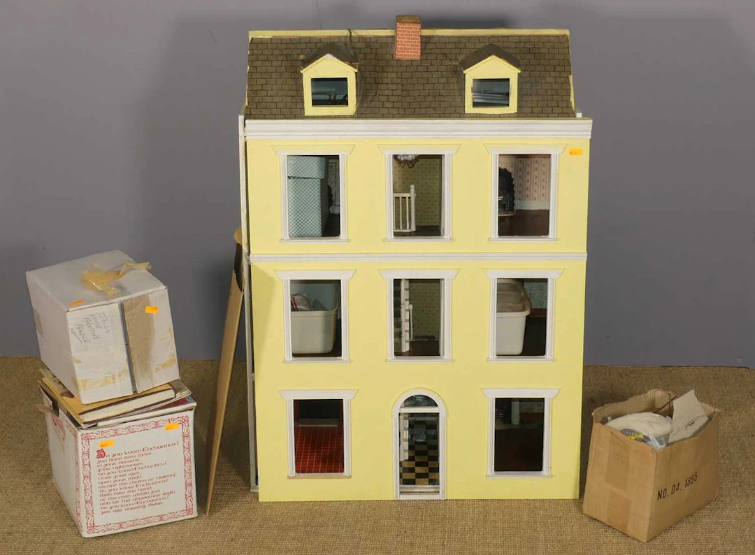 Lot 628 - A contemporary painted three-storey dolls