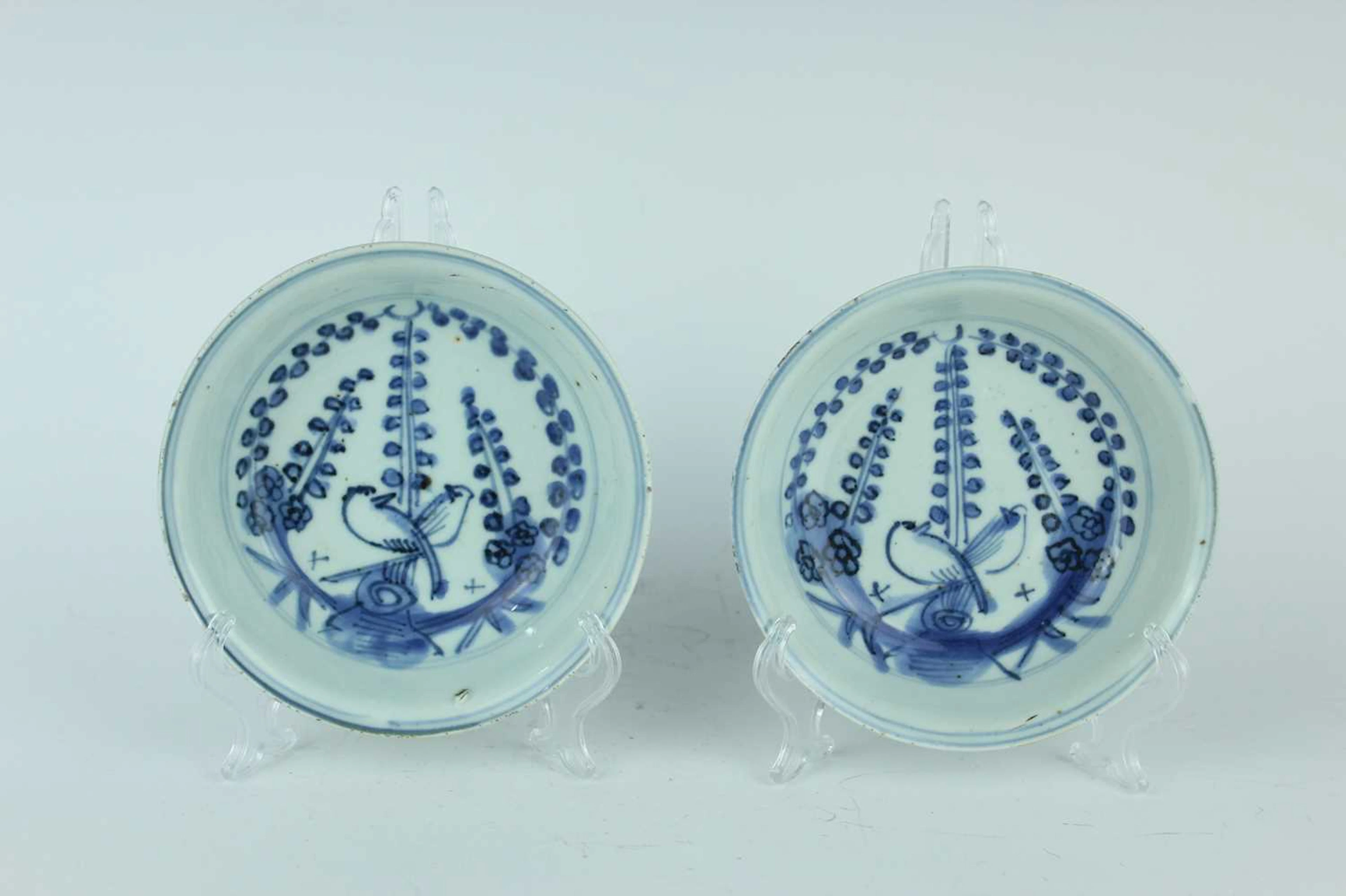 Lot 13 - A pair of Chinese blue and white 'magpie on