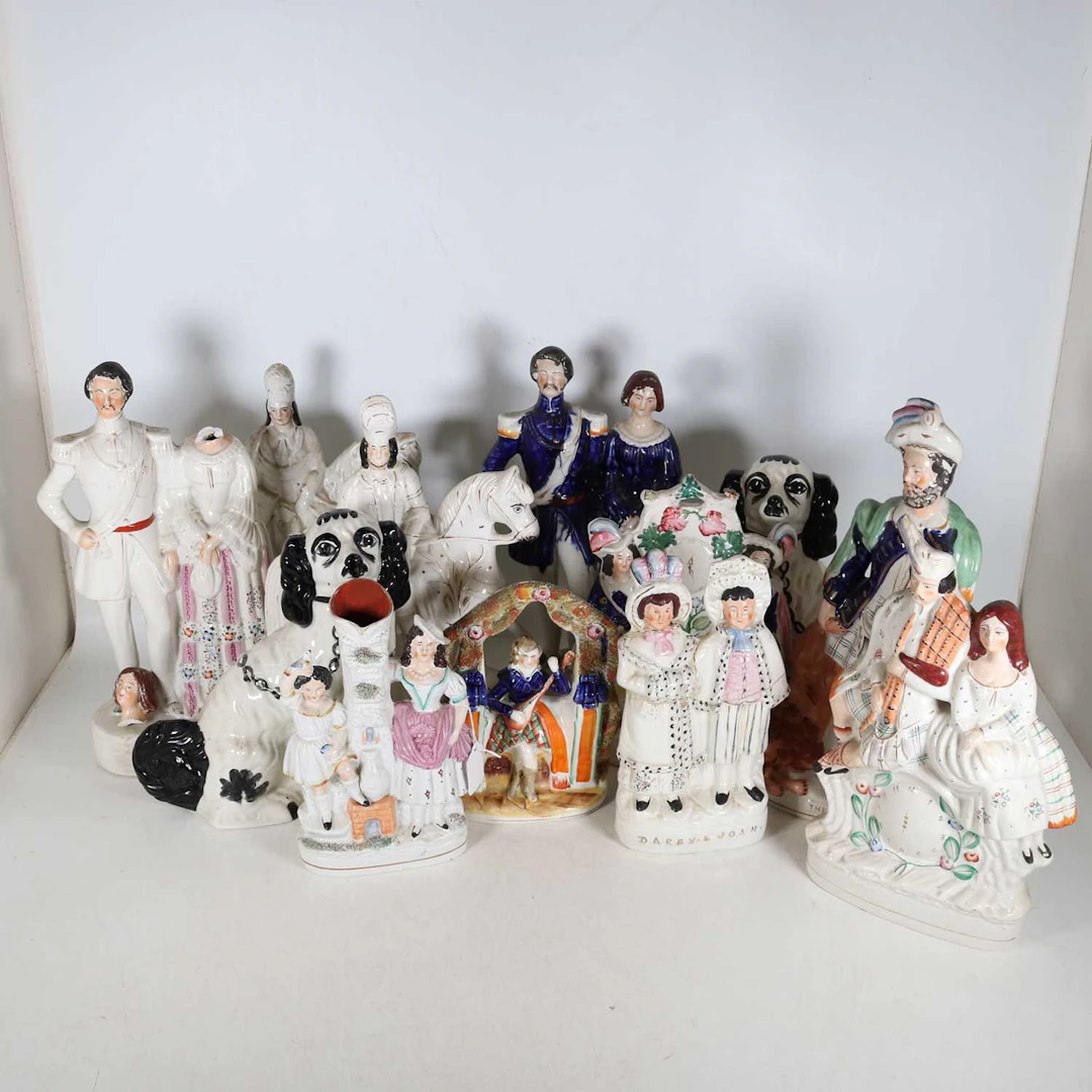 Lot 139 - A collection of Staffordshire figures, to