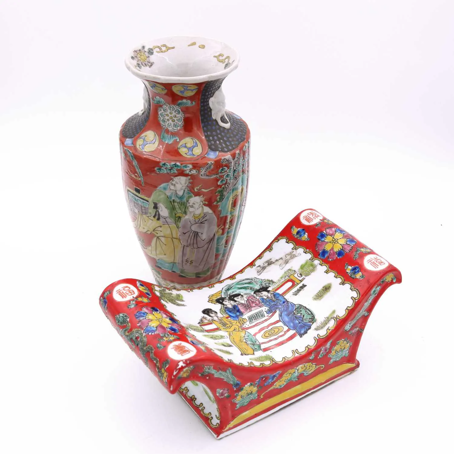 Lot 33 - A Chinese porcelain headrest, enamel
