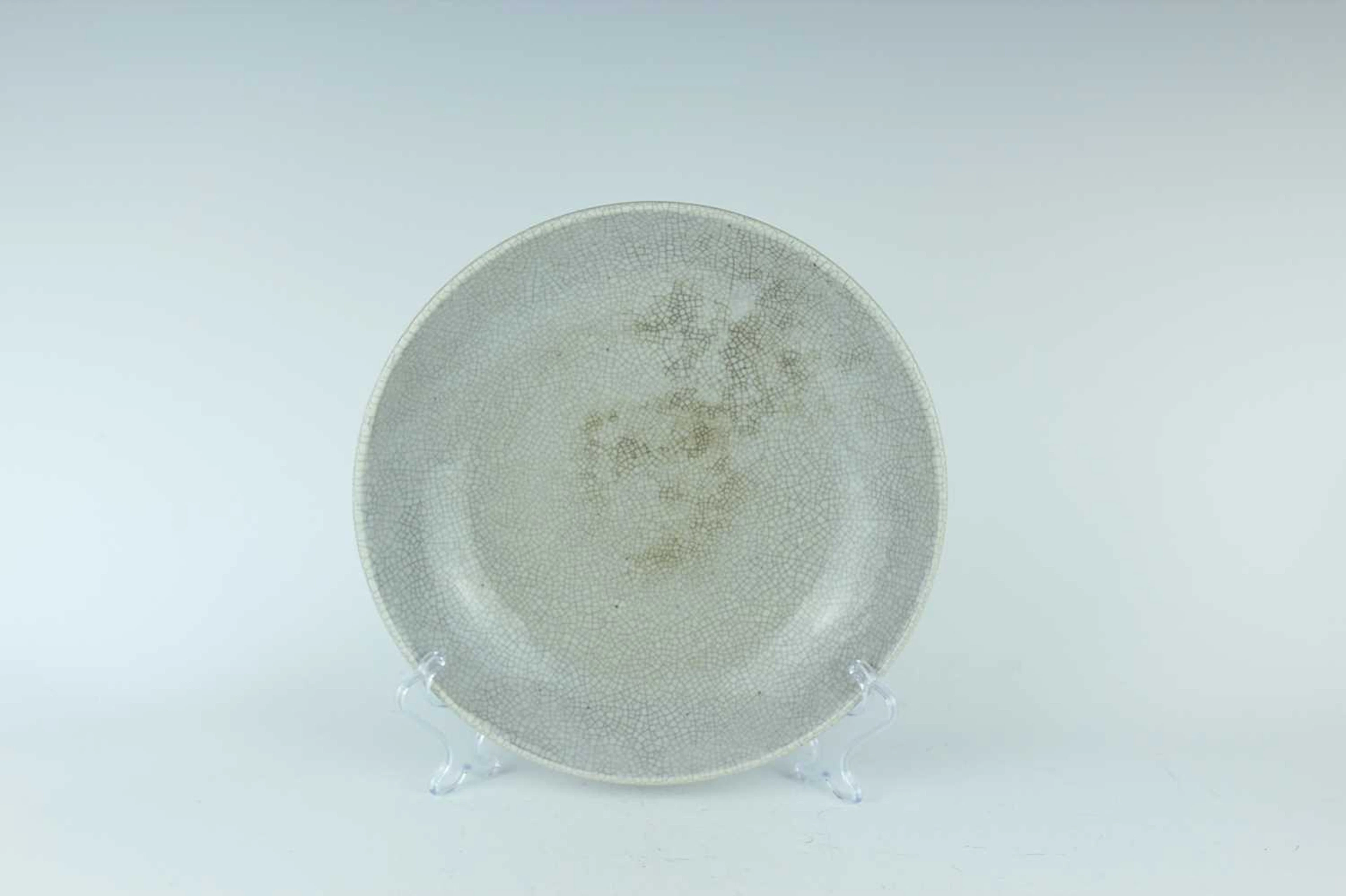 Lot 64 - A Chinese Ge-type crackle-glazed dish, 19th