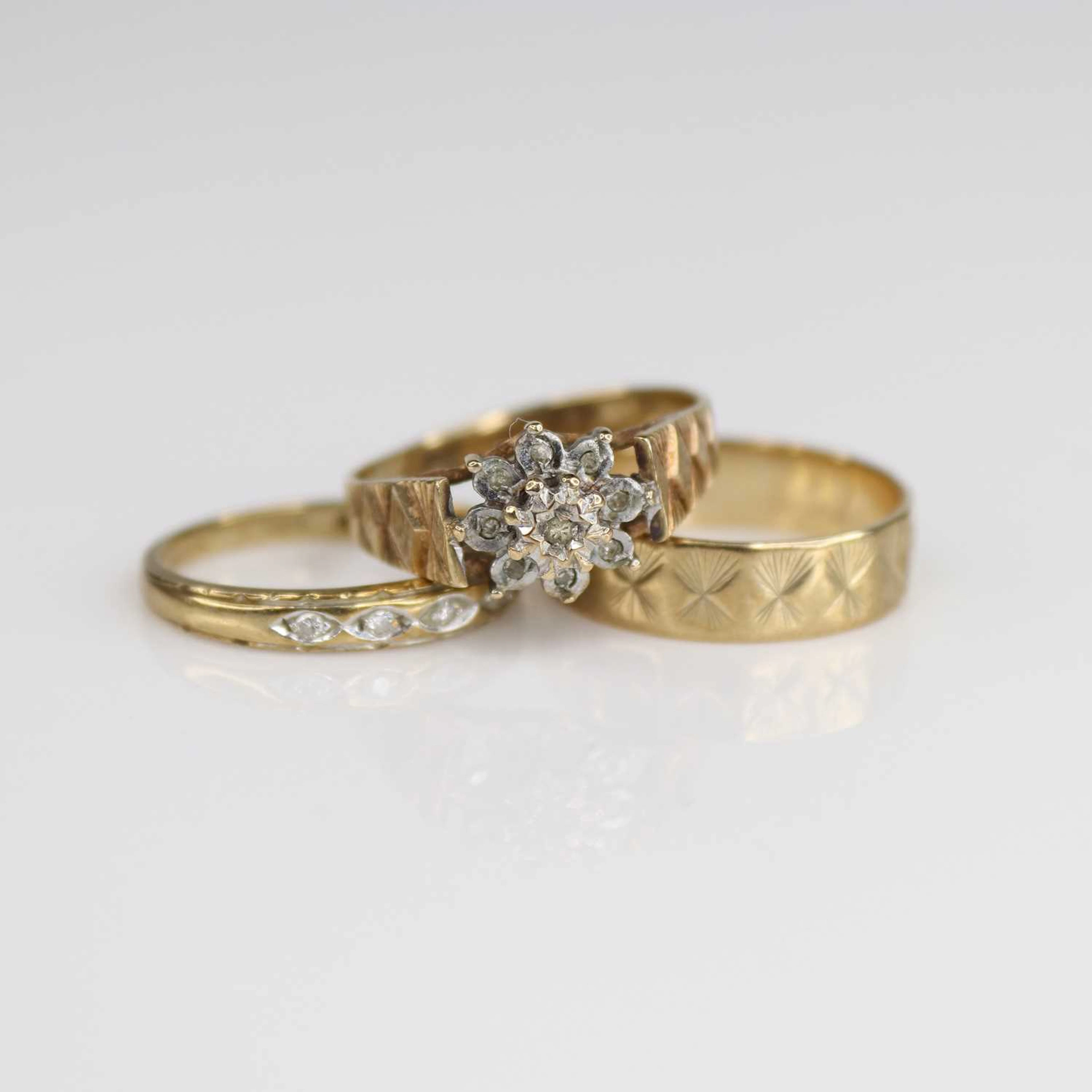 Lot 223 - Three 9ct gold rings, being a wedding band
