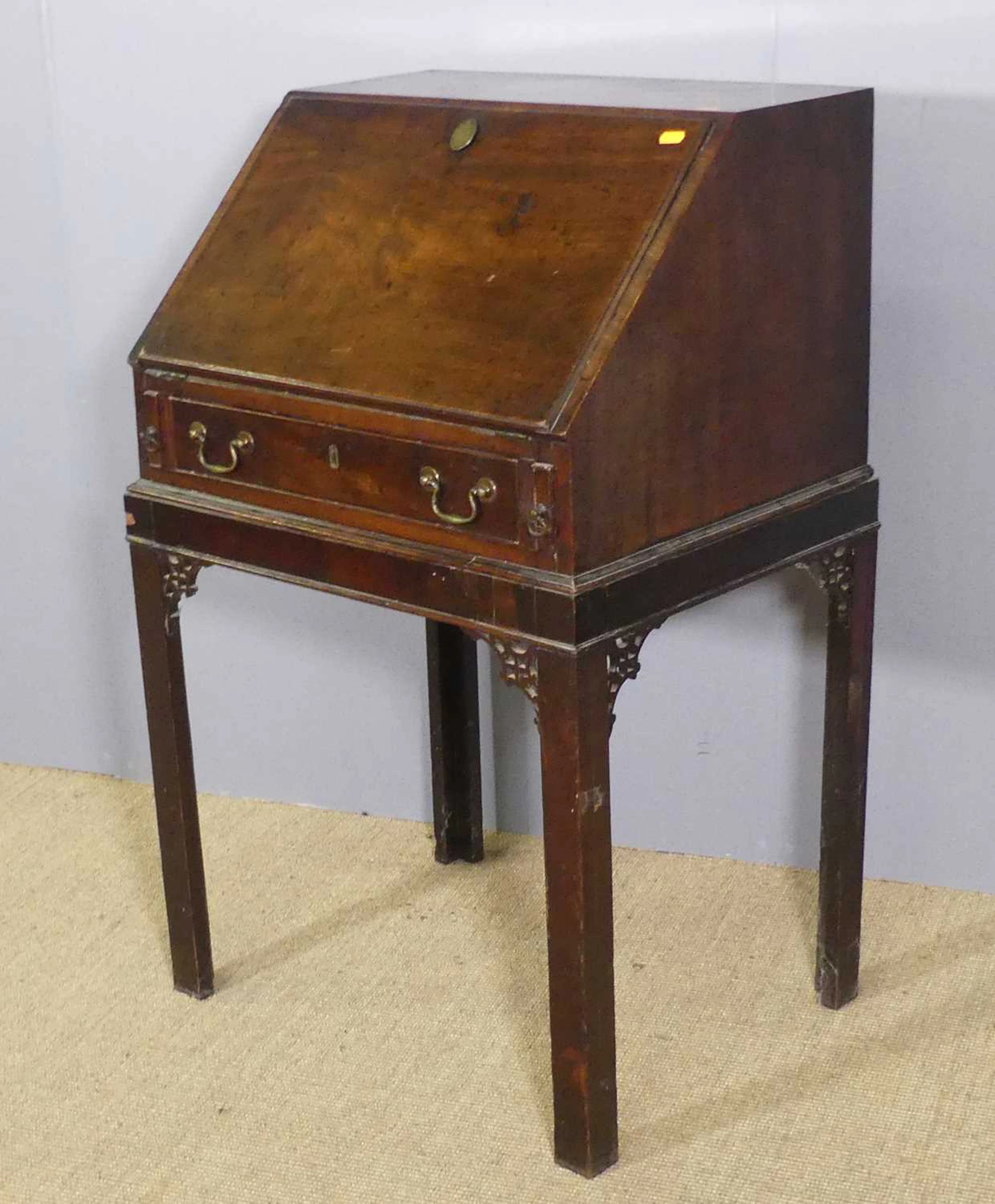 Lot 741 - A 19th century mahogany slopefront writing