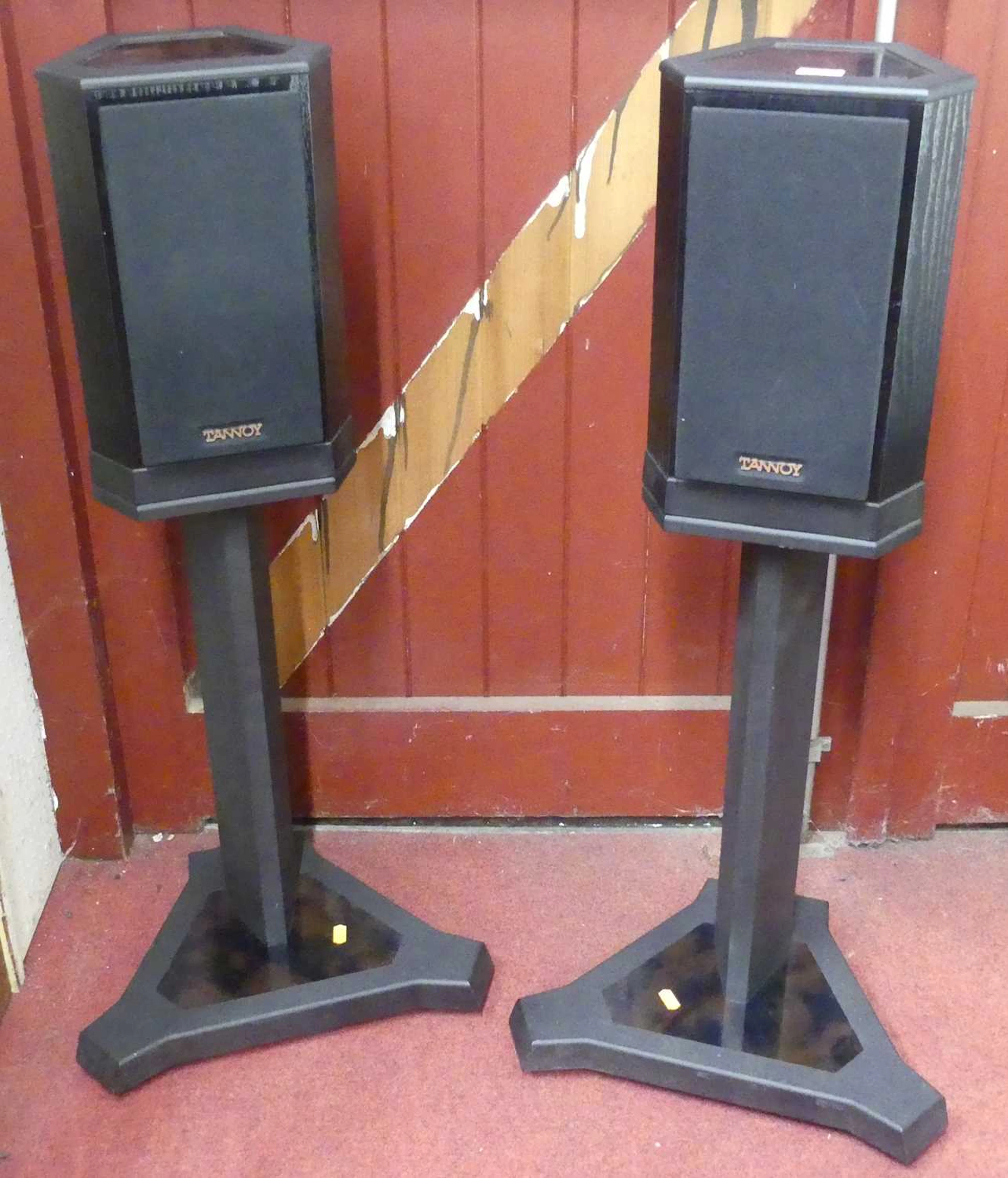 Lot 583 - A pair of free-standing Tannoy speakers, of
