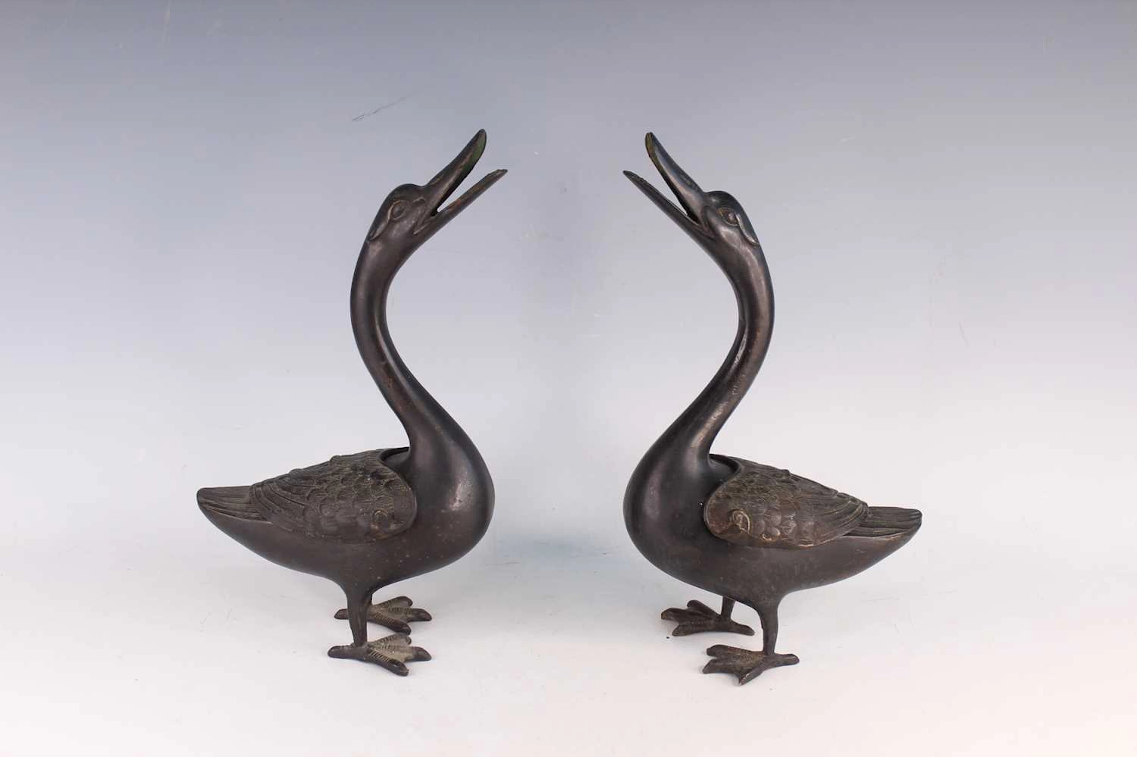 Lot 29 - A Pair of Chinese Bronze Duck-Form Incense