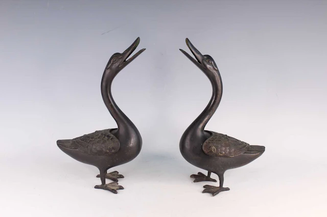 Lot 29 - A Pair of Chinese Bronze Duck-Form Incense