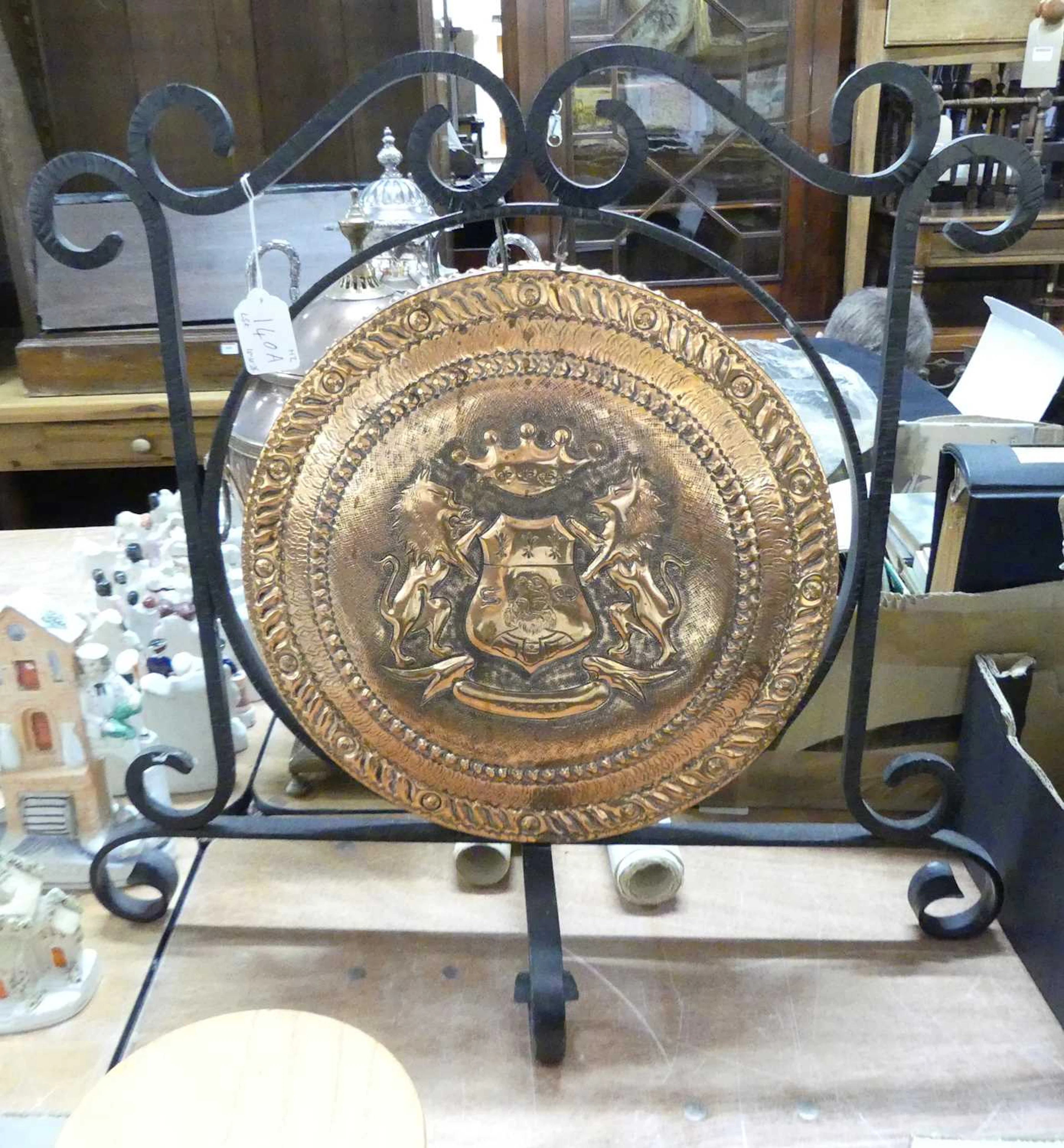 Lot 140 - A French repousse decorated brass gong