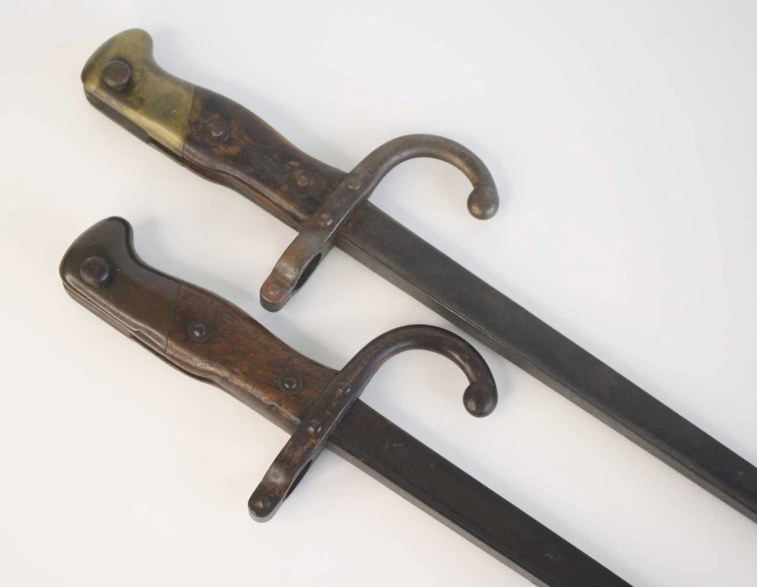 Lot 1123 - A French model 1874 Gras bayonet, the 52cm