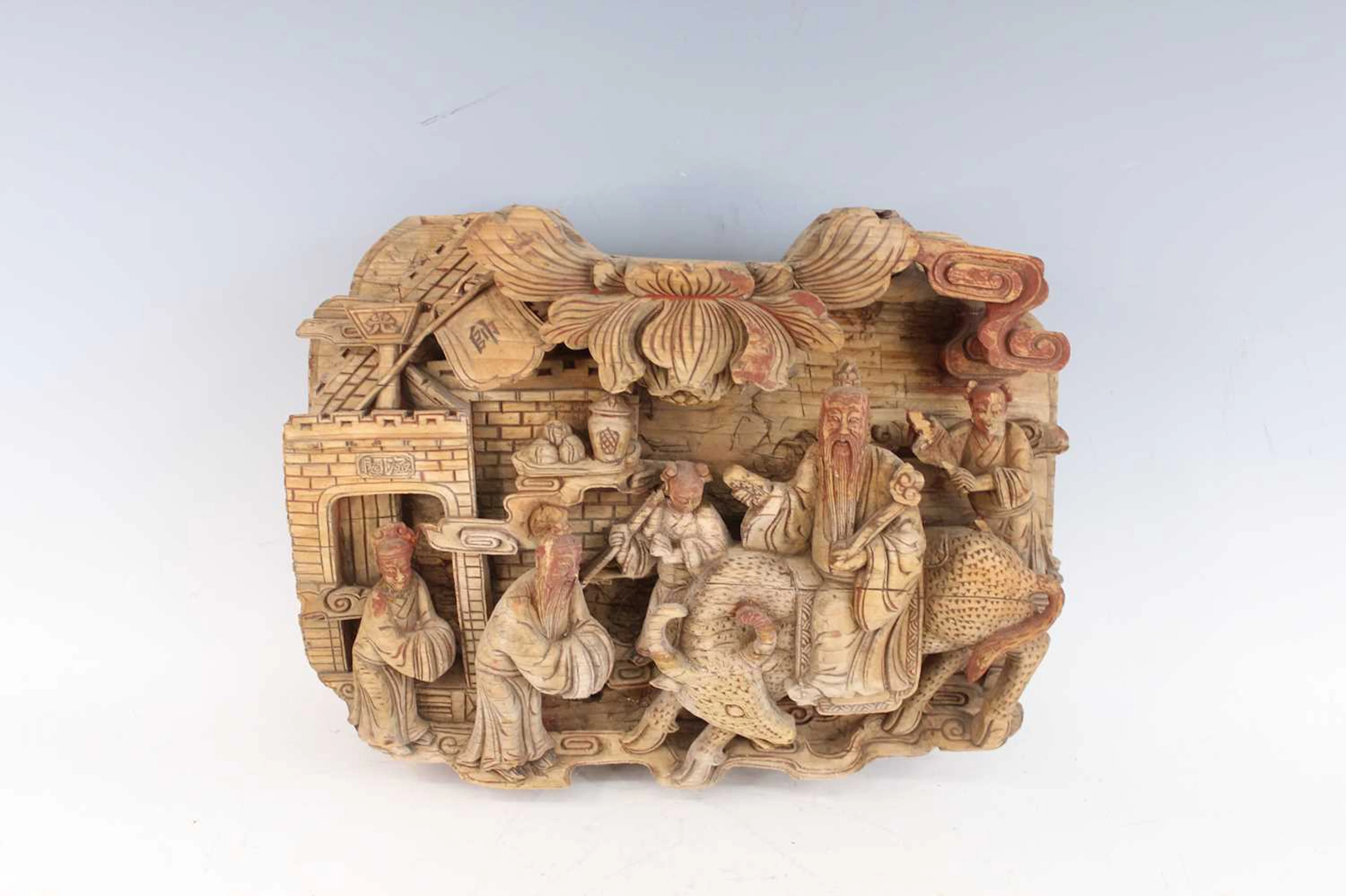Lot 162 - A Chinese carved wooden figural panel, early